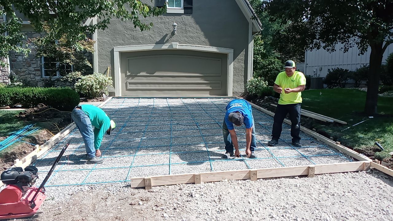 New Driveway and Sidewalk by LAND ESCAPES LLC