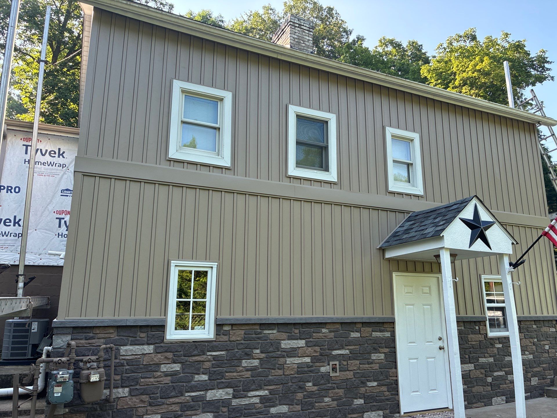 Jefferson Hills Vertical Board and Batten Siding and TandoStone Renovation by Ideal Siding Pittsburgh