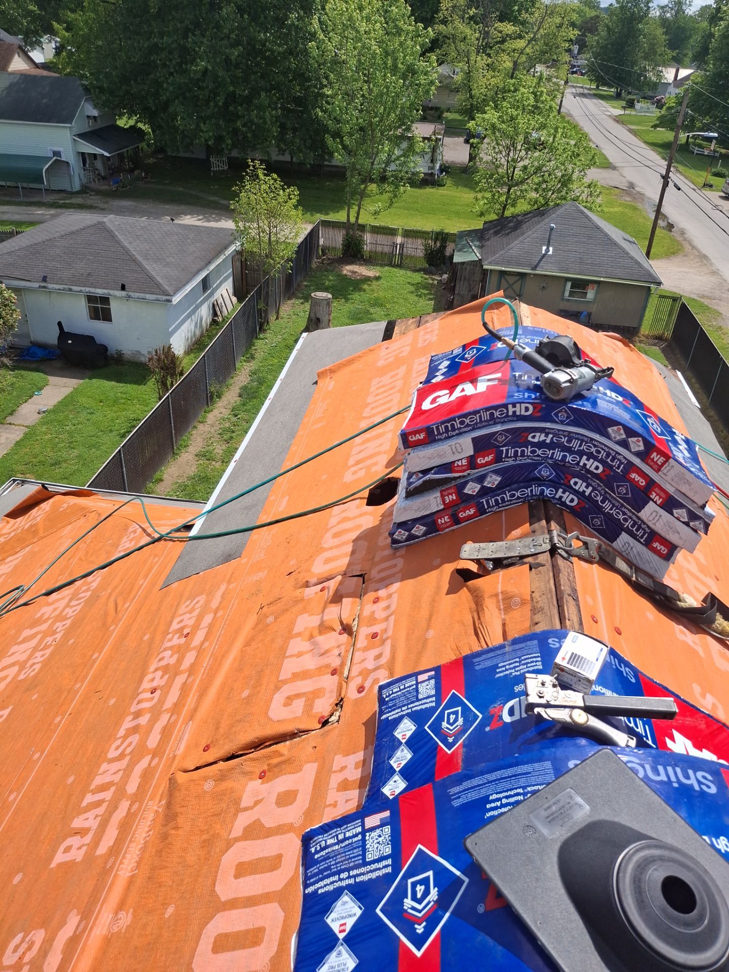 Residential Roofing Installation using GAF Timberline HDZ Charcoal by Rainstoppers Roofing