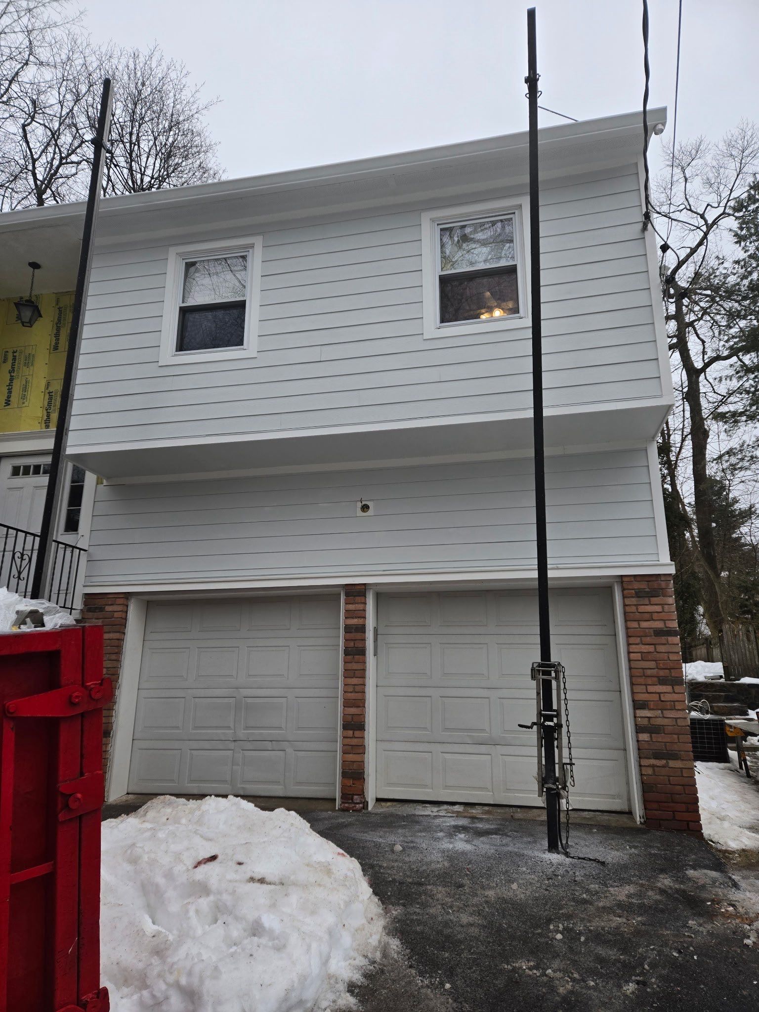 James Hardie Pleasantville Renovation by Ideal Siding 