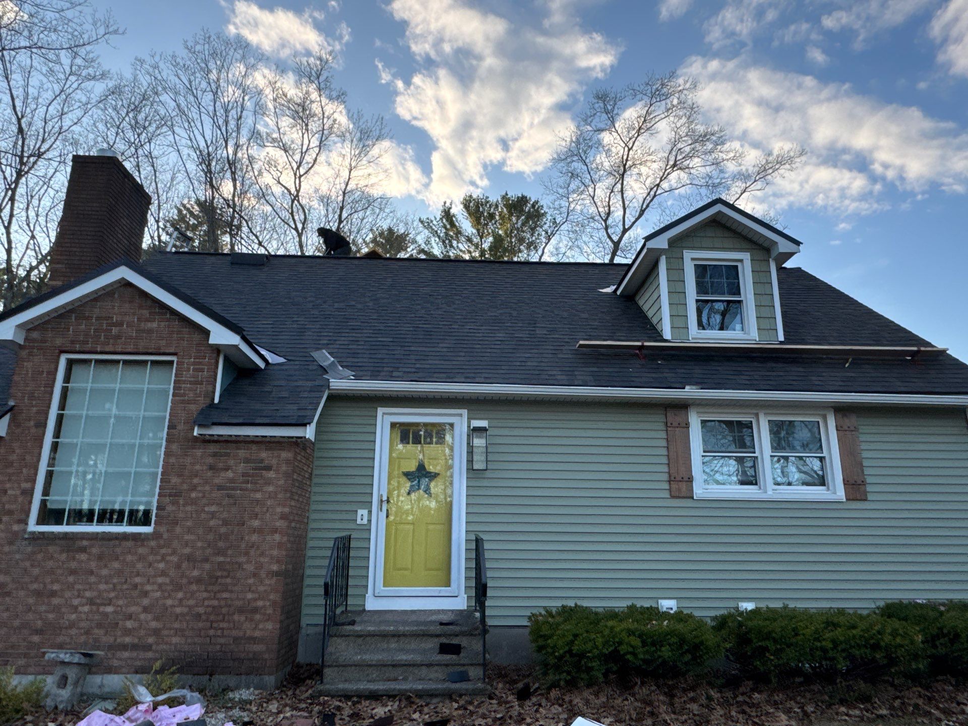Roof Replacement in Londonderry, NH with Full Re-Decking, Spray Foam Prep & Black Sable Shingles by Compass exteriors