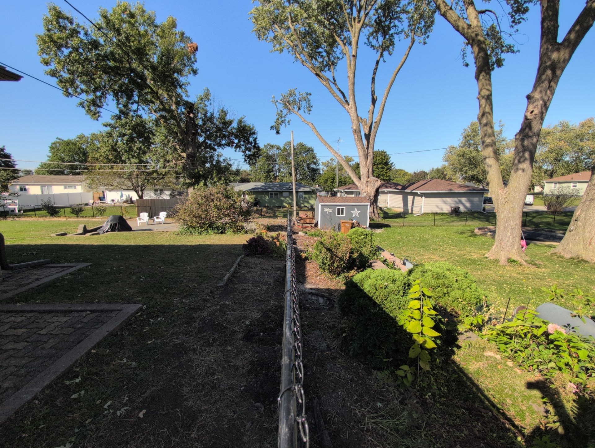 Black Chain Link Fence Installation for Waterloo Residential Property by Perfect Picket Fence and Stain