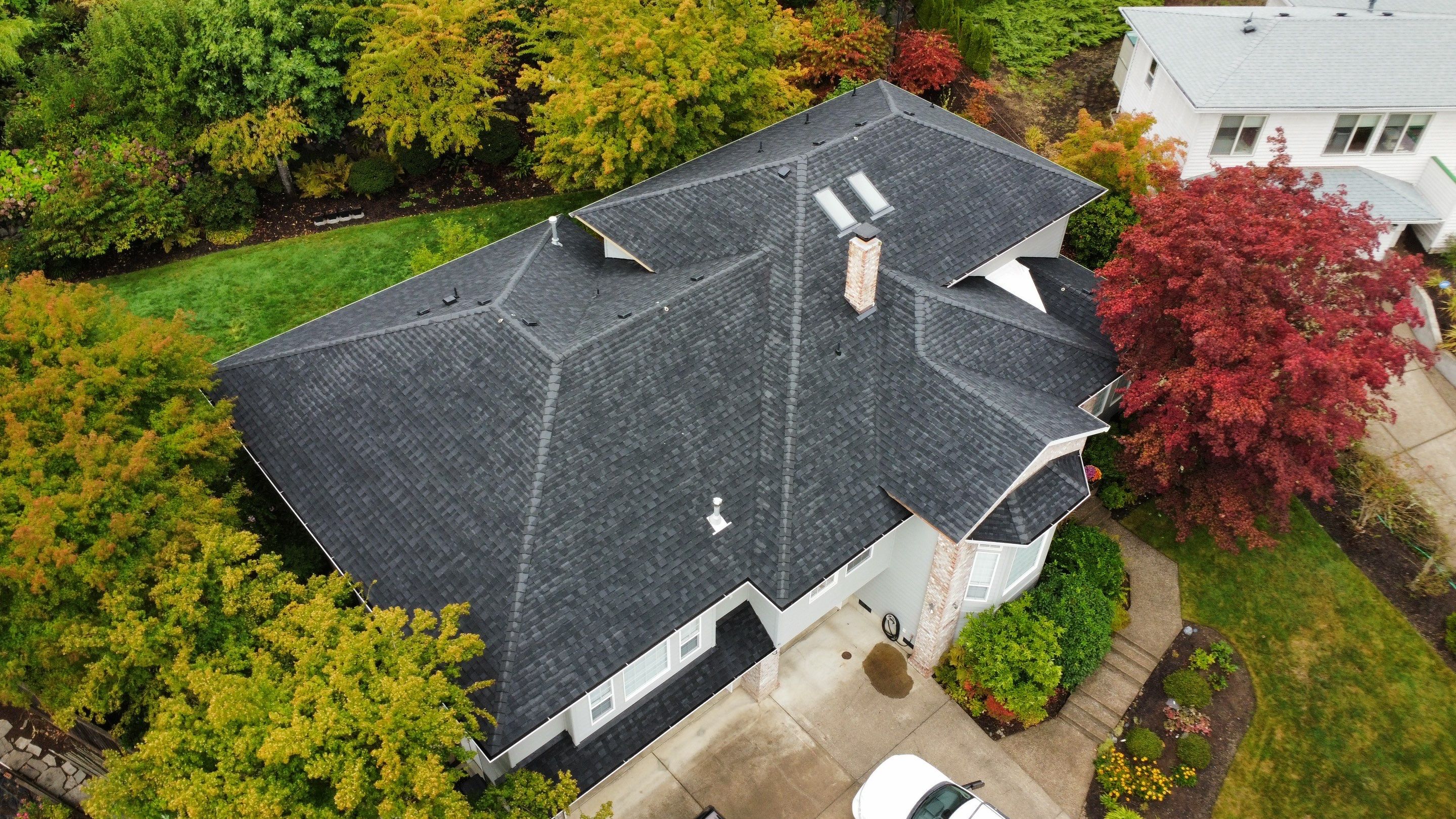 Residential Roofing Installation using IKO Dynasty (Color: Granite Black) by Orezona Building & Roofing Company, Inc.