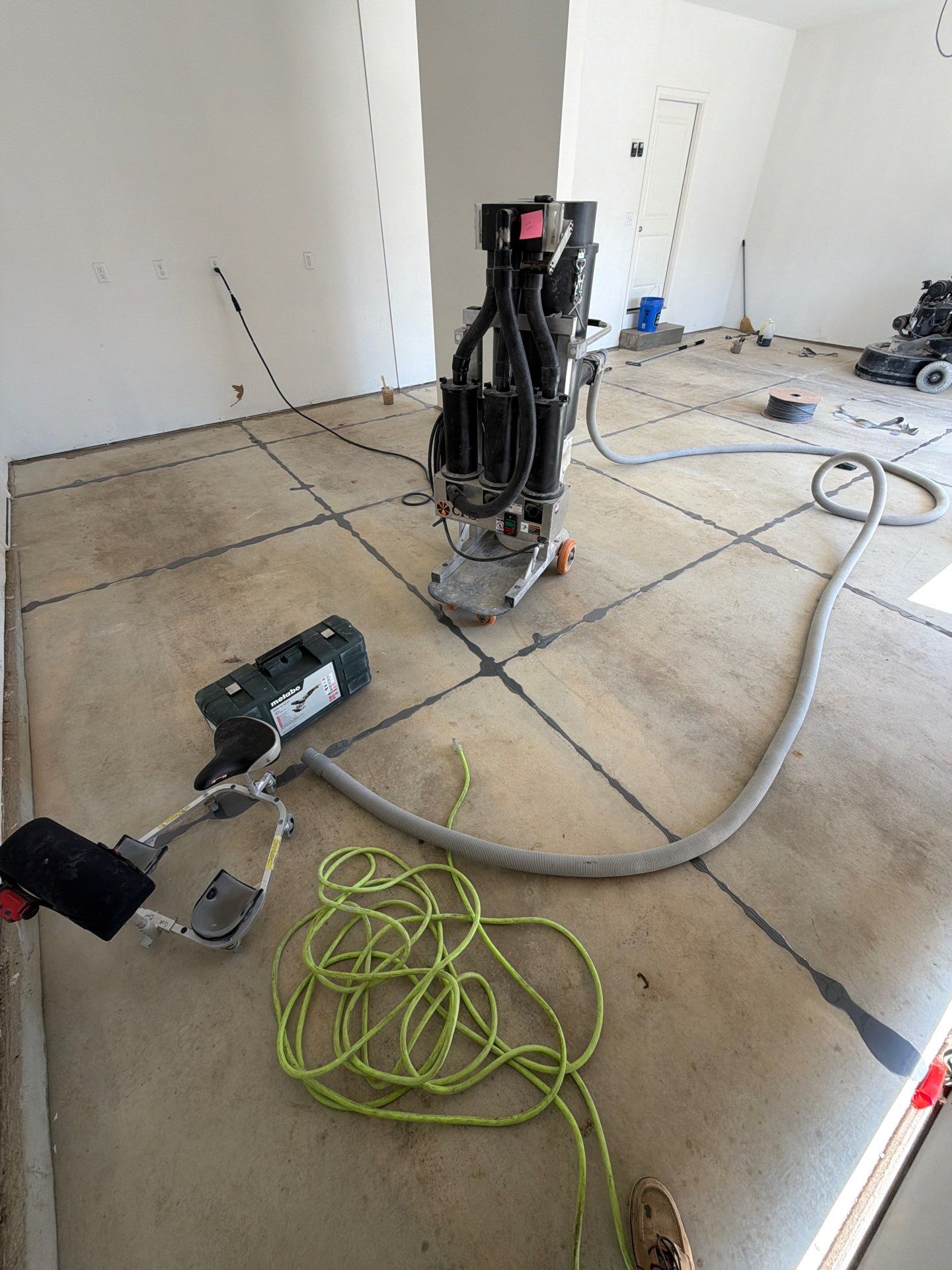 Multi-Car Garage Epoxy Flake Floor Installation in Byron Center by Gordon Painting