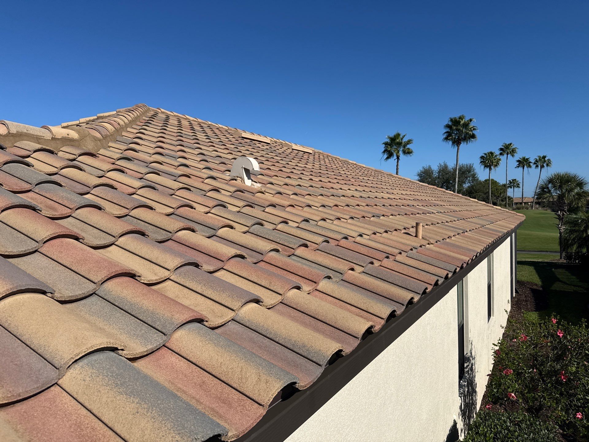 Barrel Tile Roof Cleaning & Paver Driveway Cleaning in River Strand at Heritage Harbour | Bradenton, FL by Sunshine AquaWash