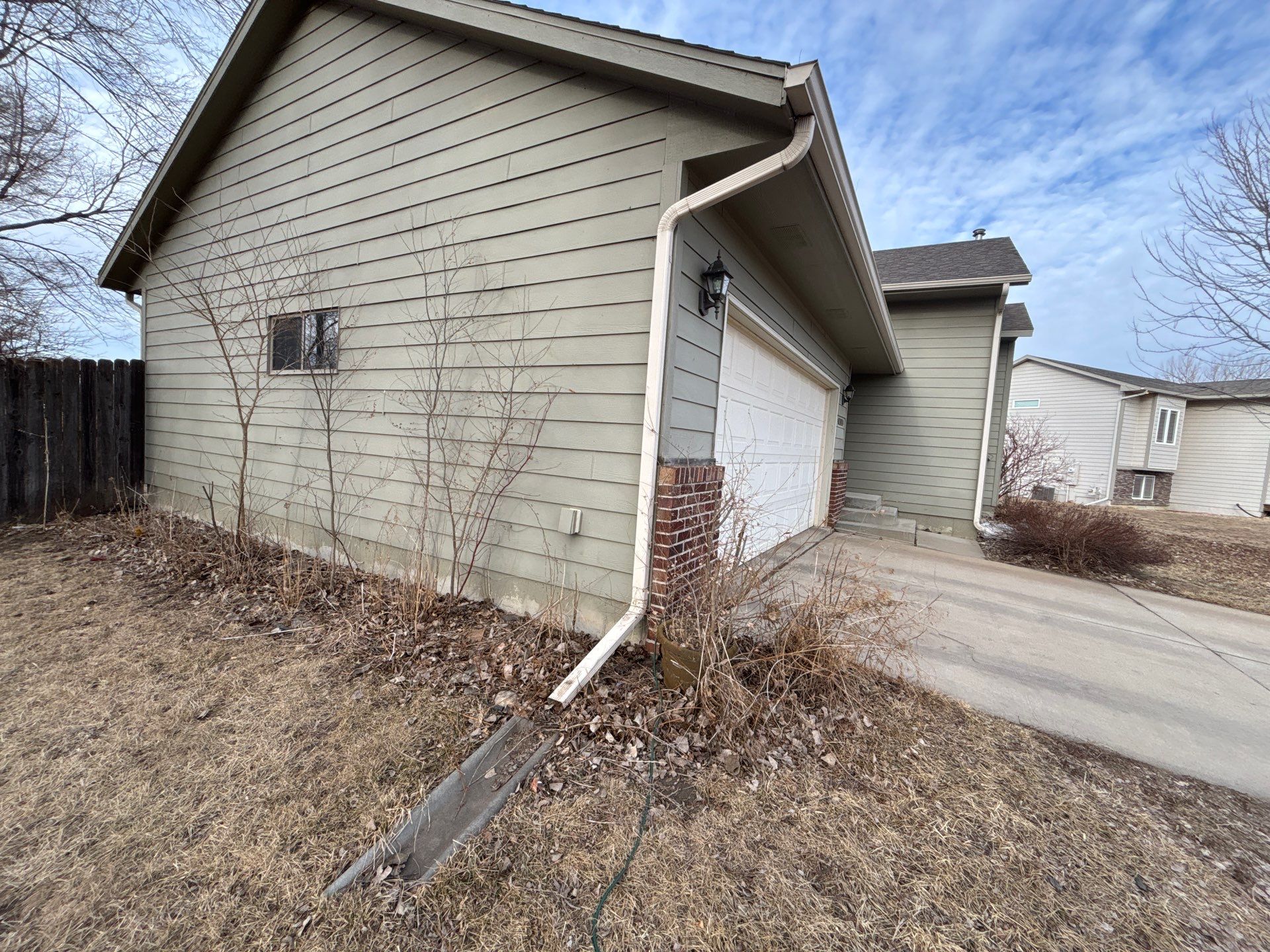 Full Exterior Residential Painting and Siding Refresh in Sioux Falls by Select Painting, Coatings & Garage Cabinets