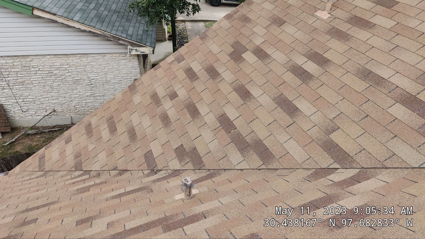 New Roof Installation Of IKO Dynasty Color Brownstone by DeZign Roofing & Exteriors