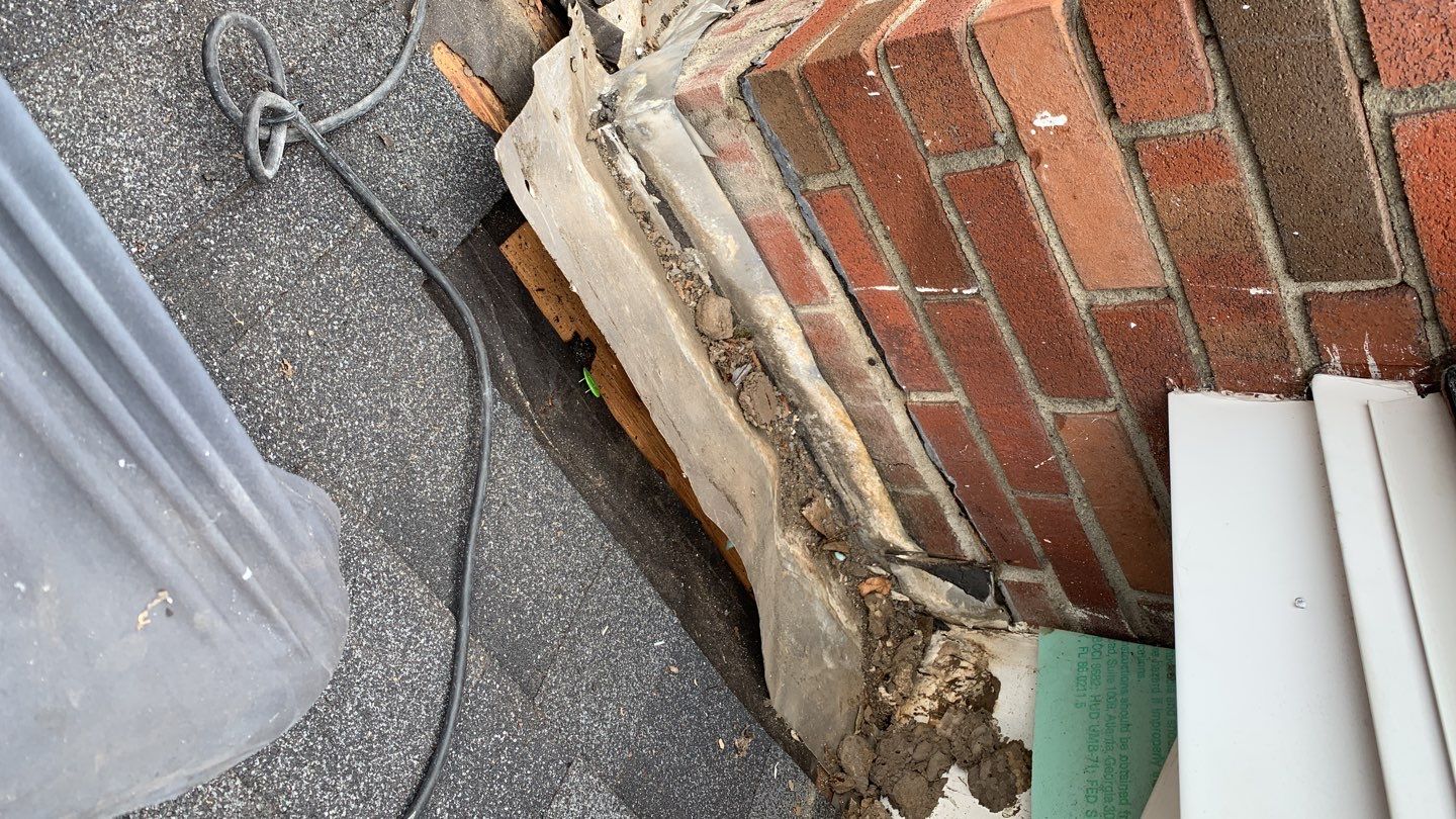 Residential Roofing Repair using Chimney Flashing by A Plus Exterior