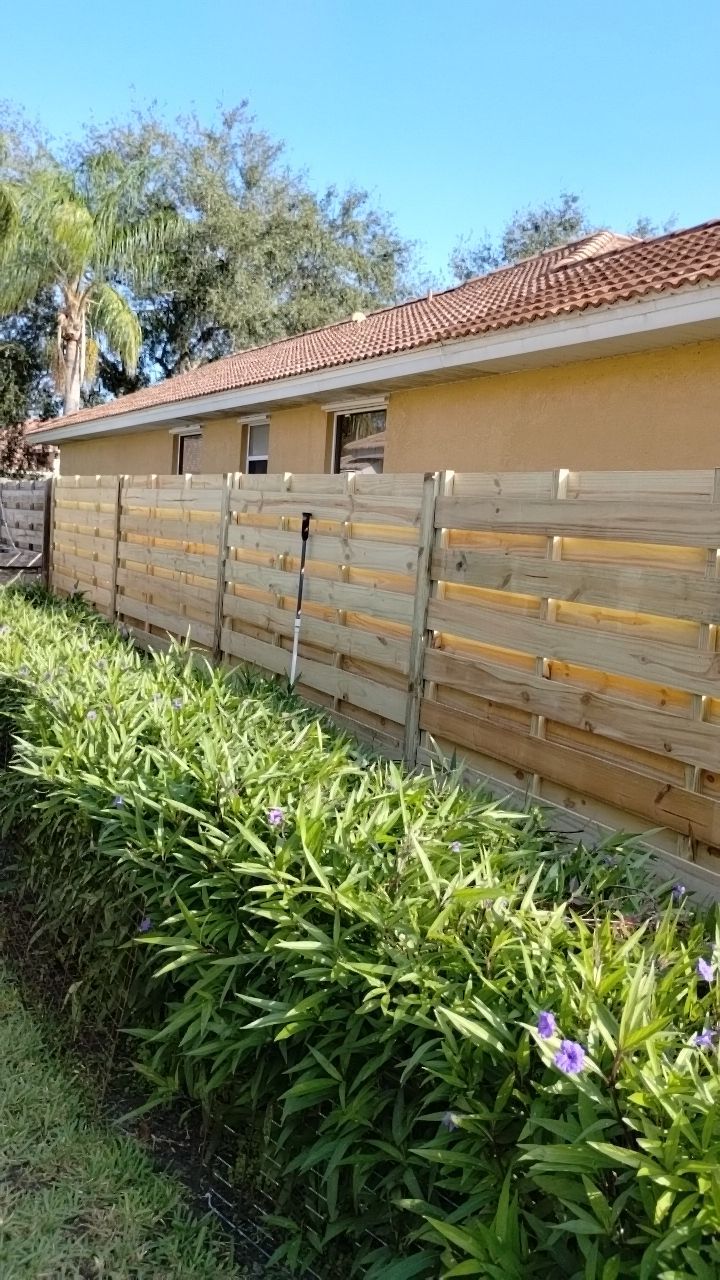 Wood Fence Installation using Shadowbox Wood Fence by Asap fence and gates, LLC