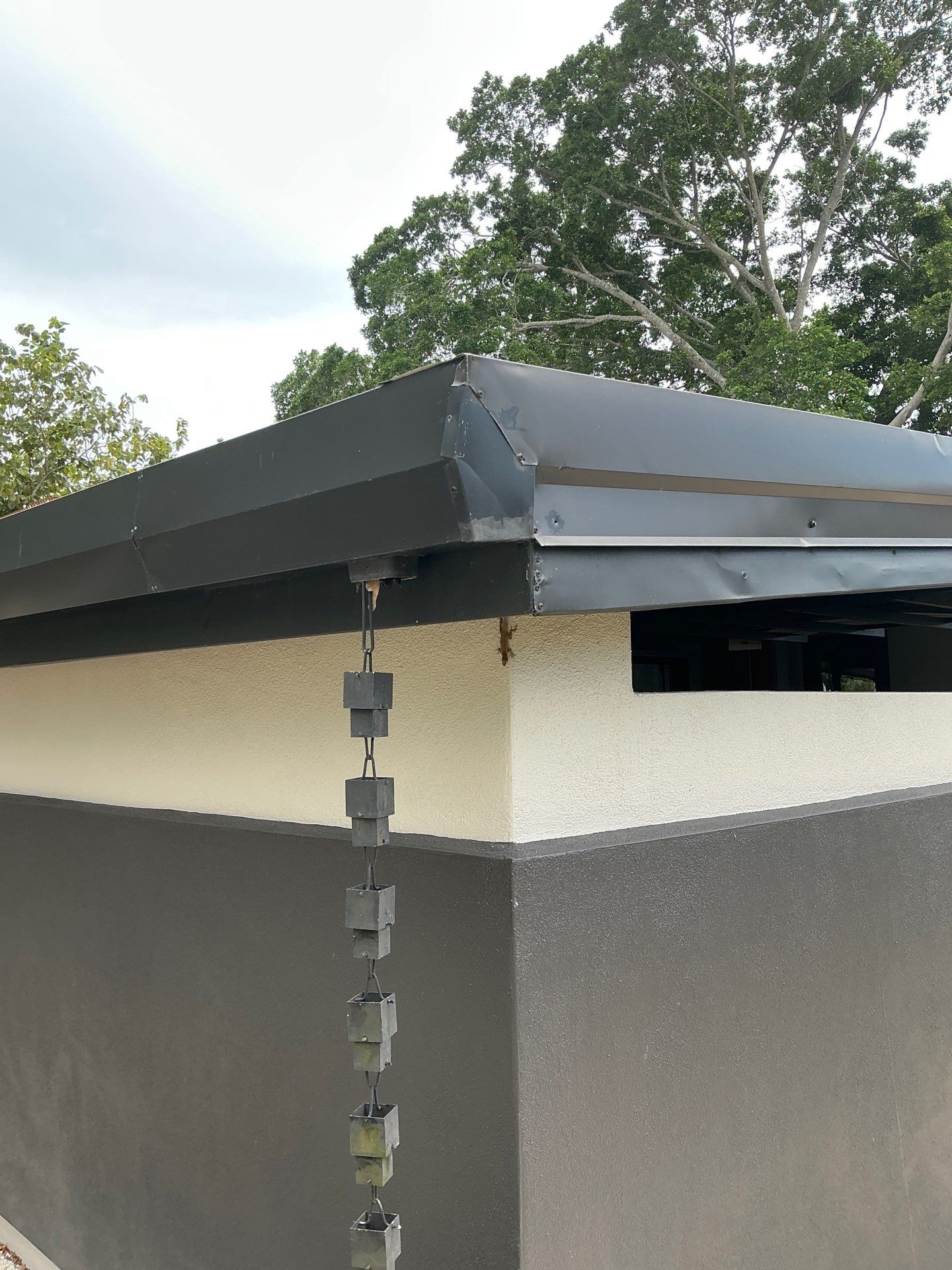 Black Seamless Gutters in Sarasota FL by Gutter Professors
