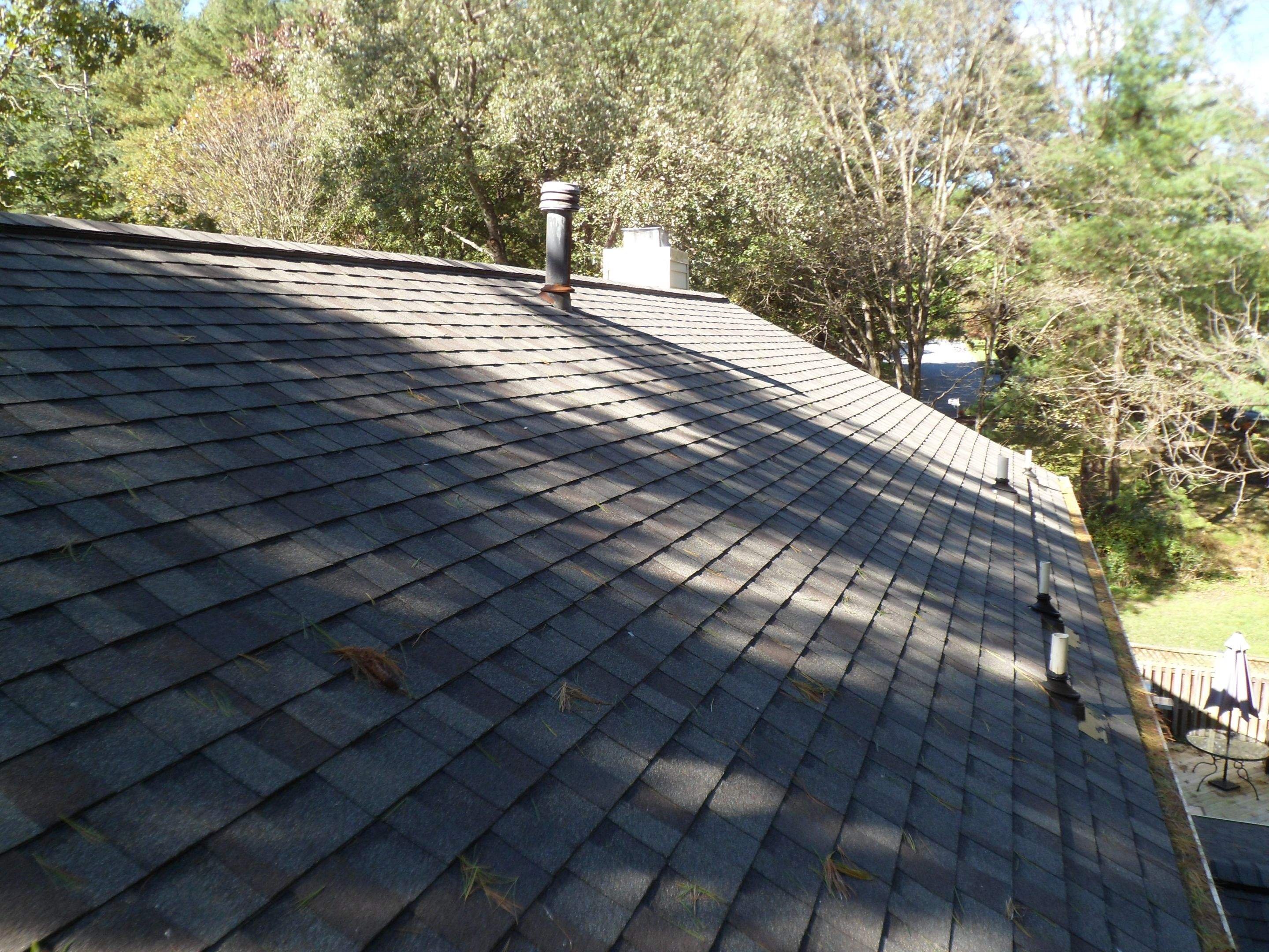 Residential Roofing Installation using Landmark Shingles Color Weatherwood by Alpha Design Services