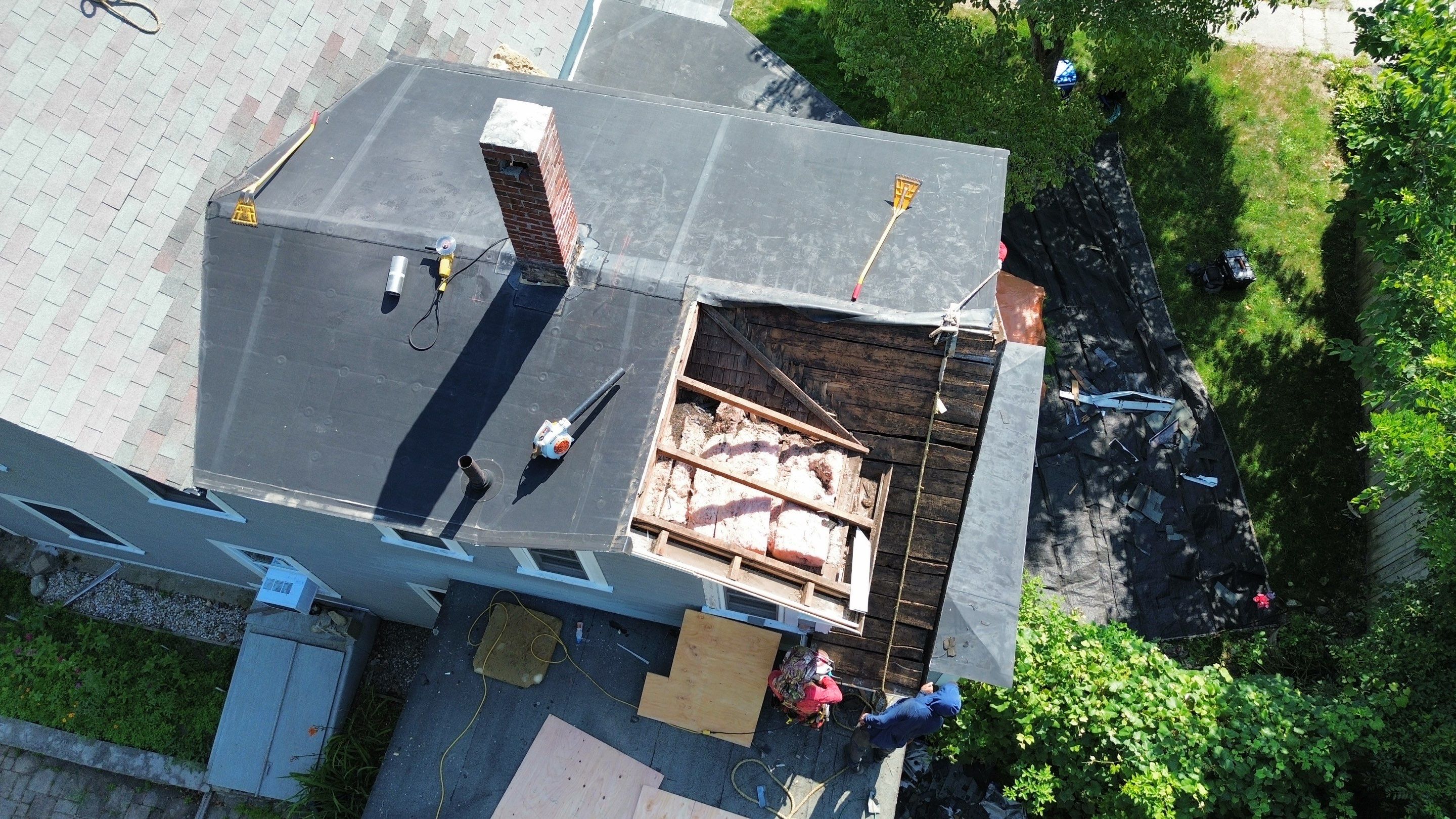 Full Roof Replacement + Custom Gutter Install | Onyx Black Finish by Mighty Dog Roofing of Greater Middlesex County