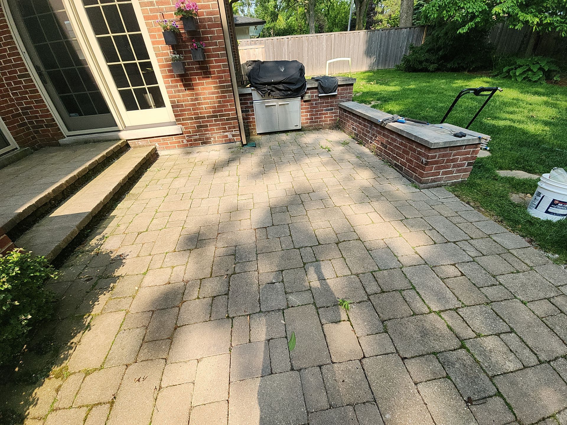 Brick paver repair, clean, seal and poly sanding by Northern Power Washing LLC.