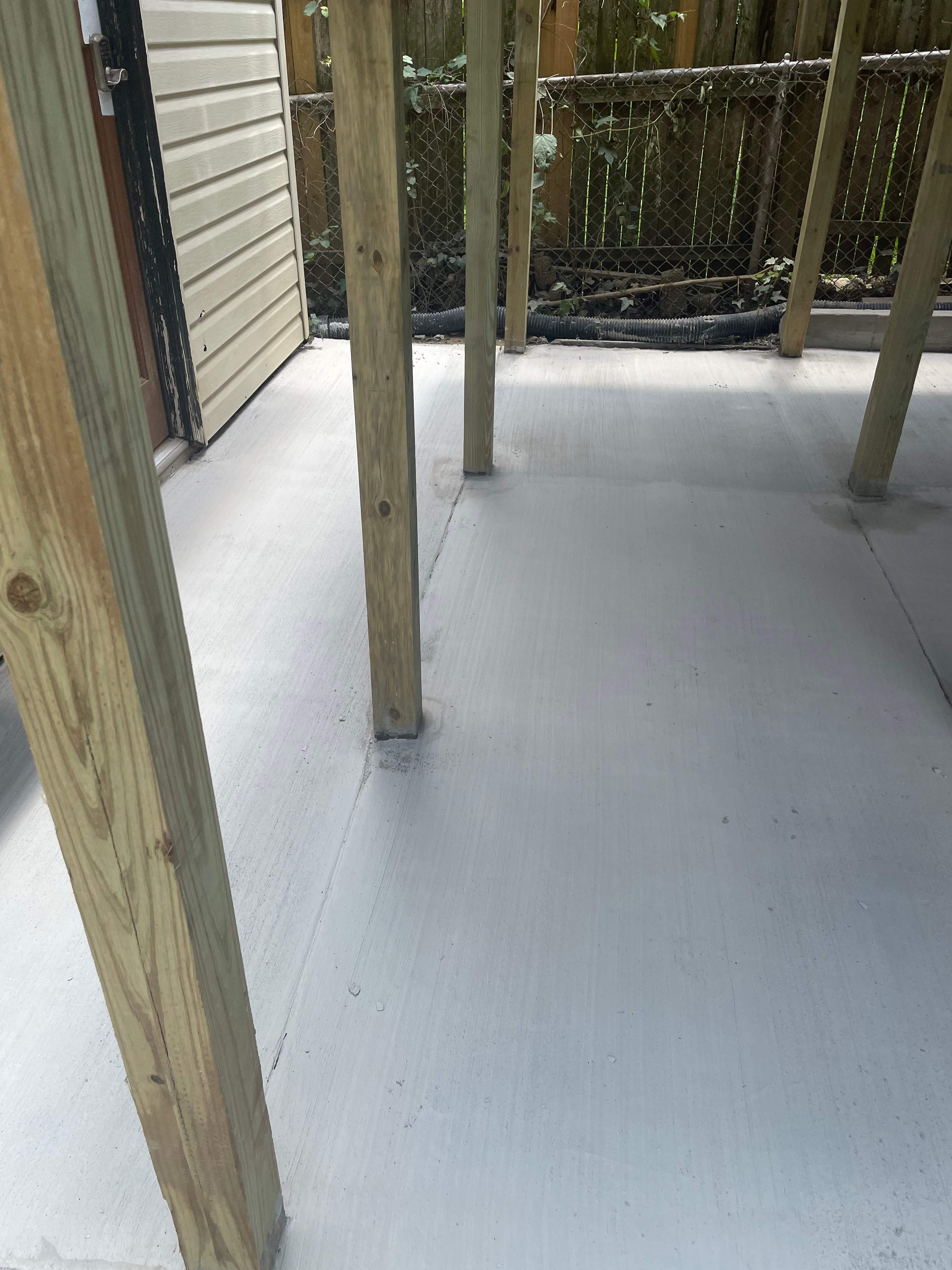 Deck resurfacing, railing replacement and concrete resurfacing by Fairfax Contractors, LLC