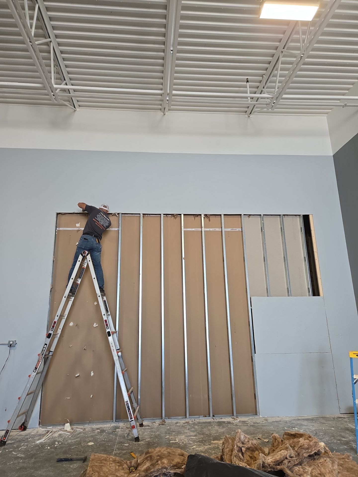 Commercial Shop Expansion Complete by A Step Above Handy LLC