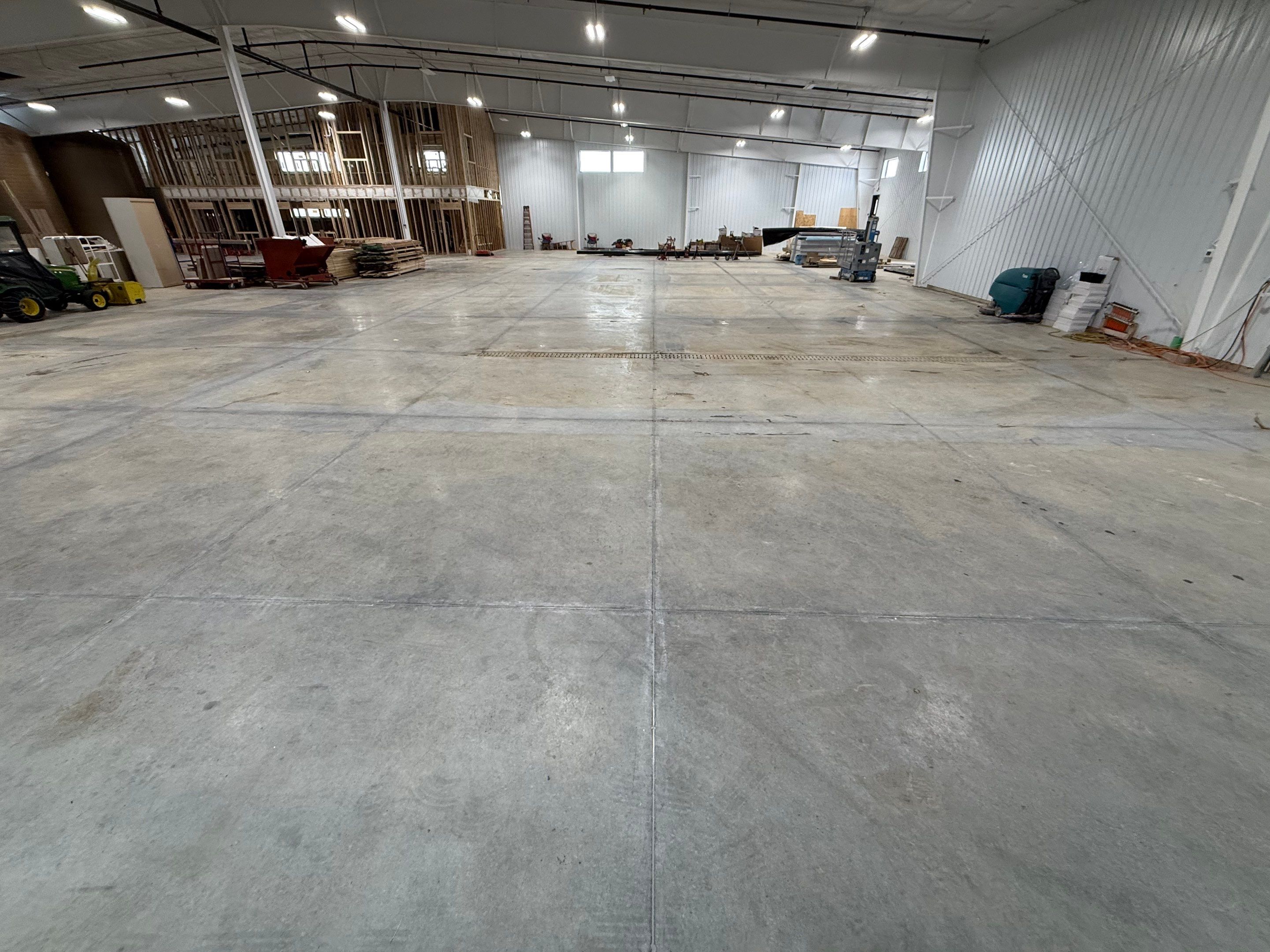Industrial Concrete Polishing and Coating for Large Manufacturing Warehouse by Select Painting, Coatings & Garage Cabinets