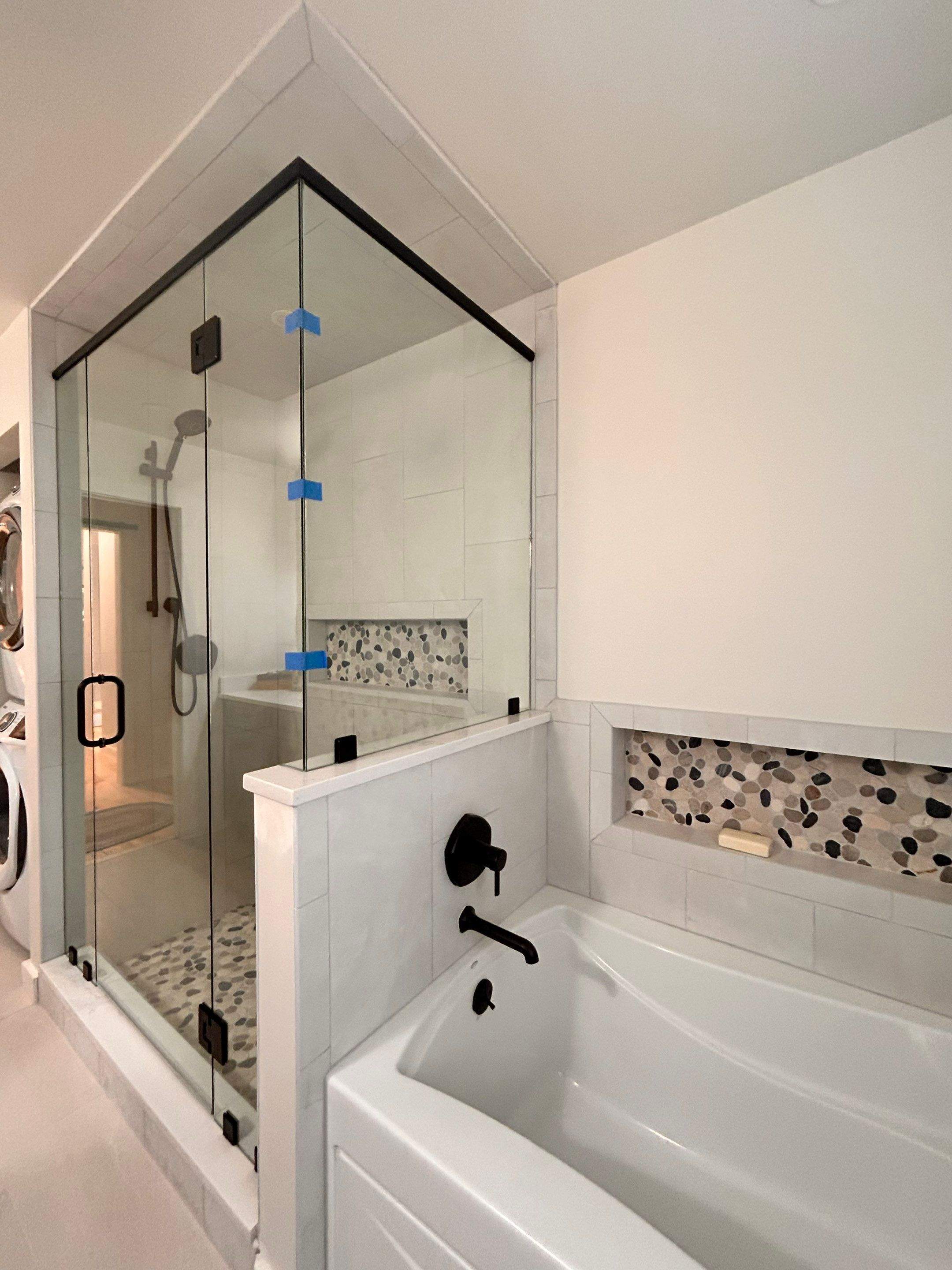 Frameless Shower Enclosure w/Header Bar by Cheshire Glass Company