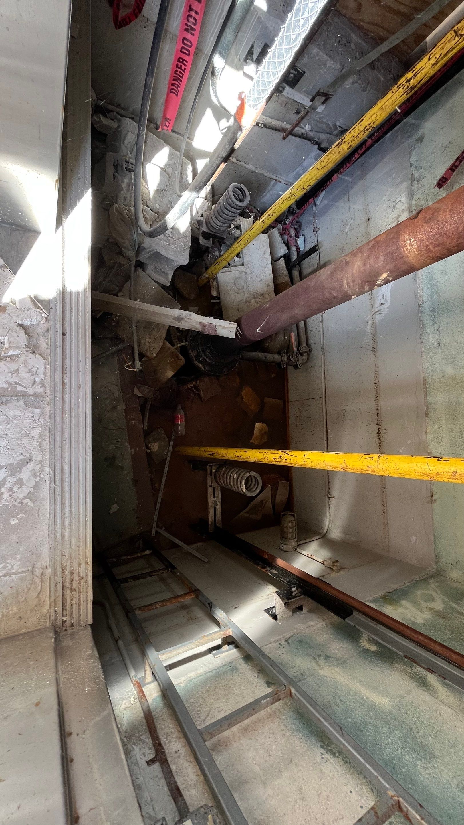 Condo Elevator Shaft Clean Out and Remove Bloackage in Storm Drain System by APS Power & Water