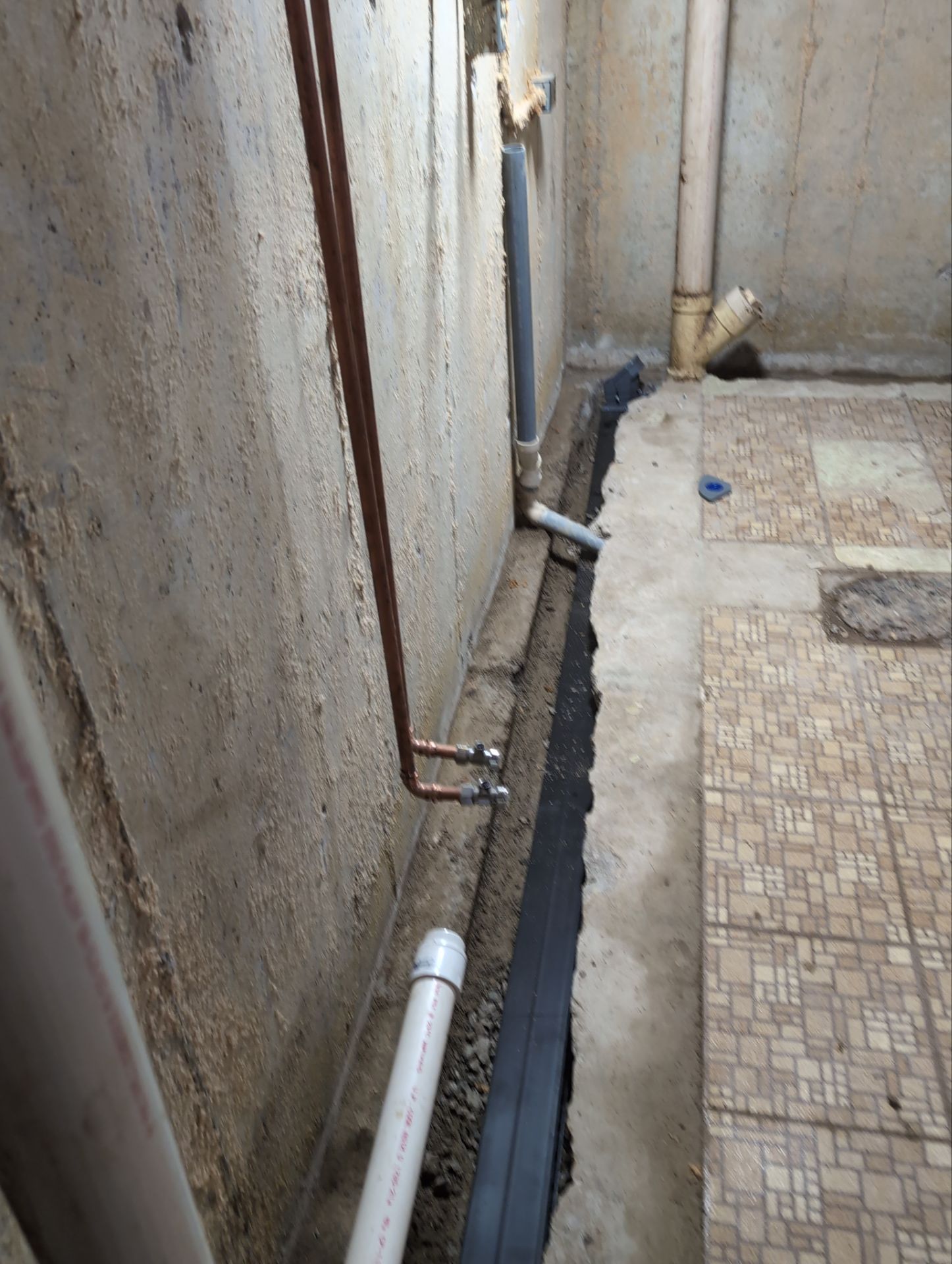 Interior Basement Waterproofing System and Egress Window Installation by Toledo Basement Repair 