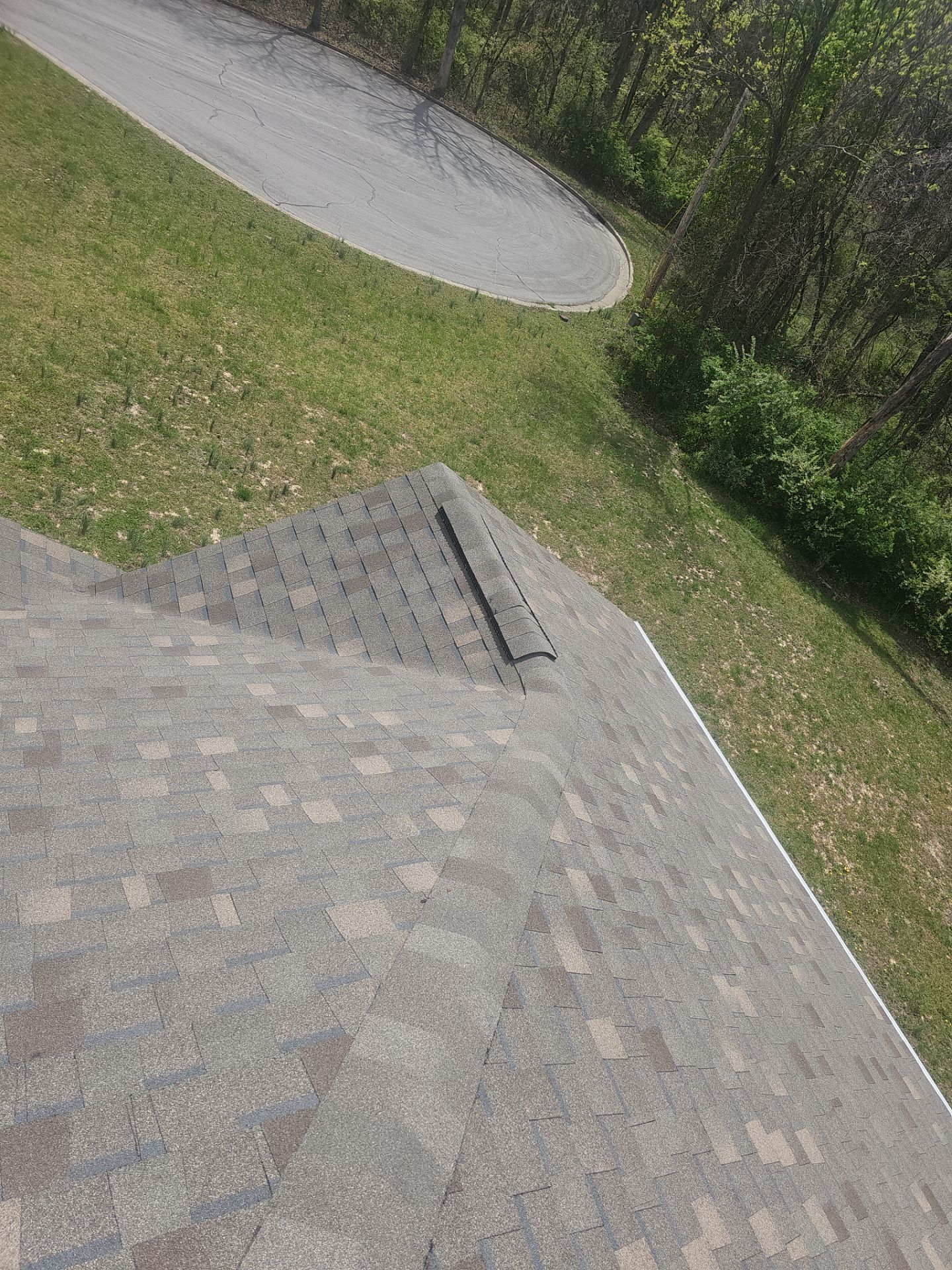 Residential Roofing & Gutter Cover Install  by Titan Commercial & Residential Roofing 