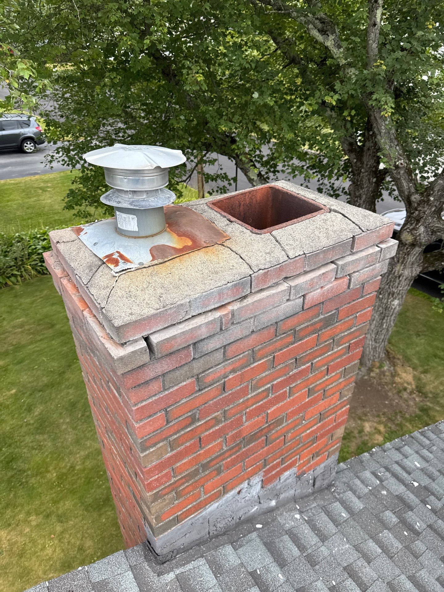 Lowell Premium Velux Curb-Mount Skylight & Chimney Restoration by Mighty Dog Roofing of Greater Middlesex County