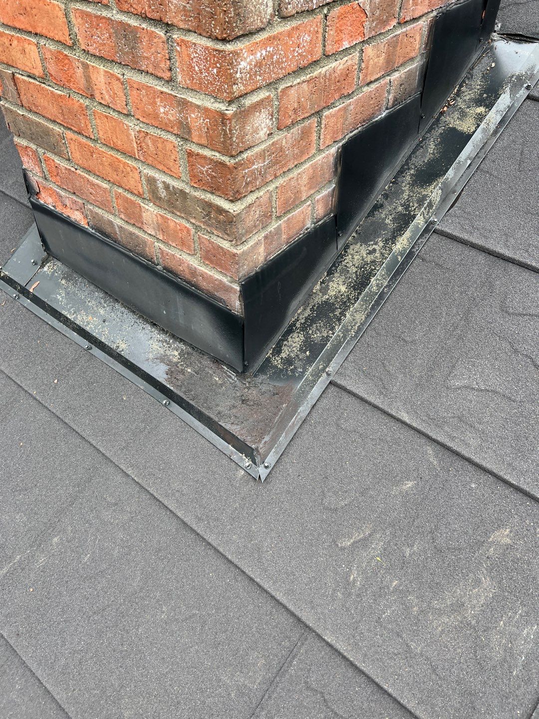 Residential Roofing Repair using Chimney counter flashing by Nitro Roofing and Construction