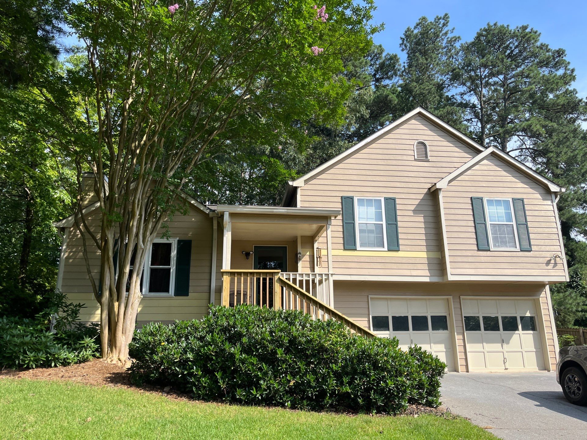 Rotted Wood Replacement, Deck Stain, and Exterior Paint Project in Kennesaw, GA by Nelson Exteriors 