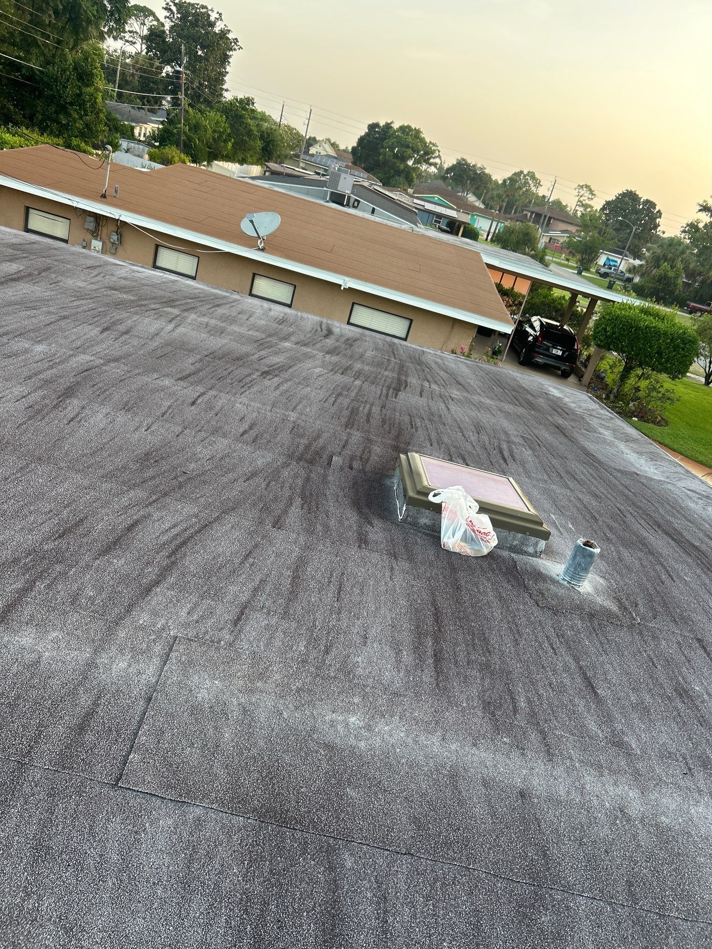 Colonial Slate Modified Bitumen Flat Roof Replacement in Daytona Beach by Pinnacle Roofing Group