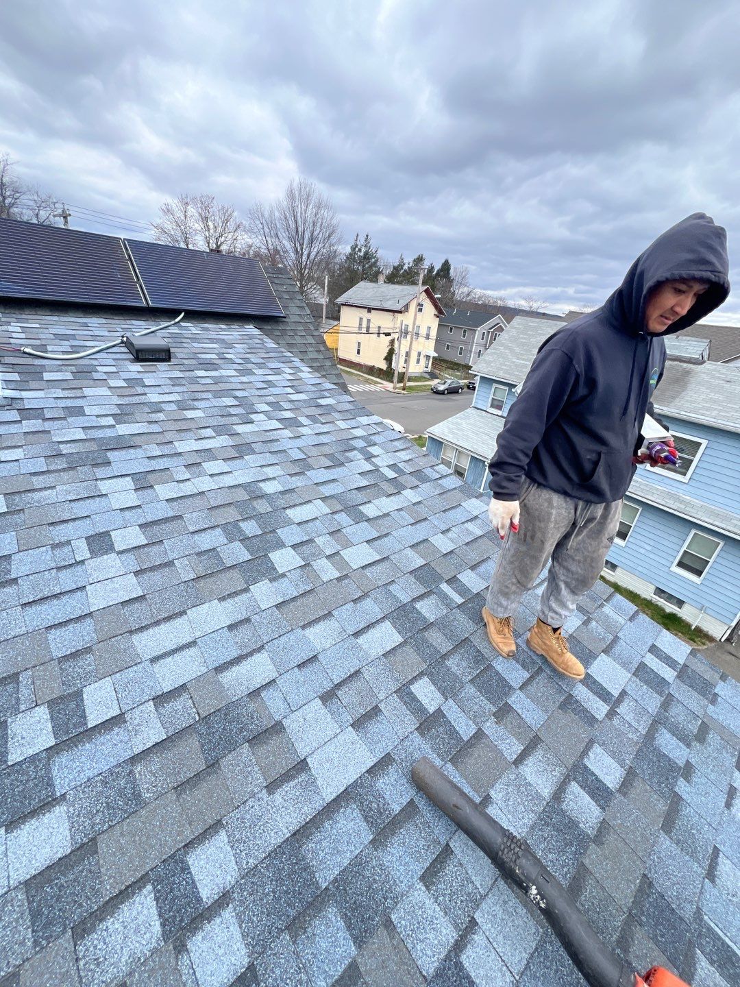 Atlantic Blue Shingles by Reimagine Roofing