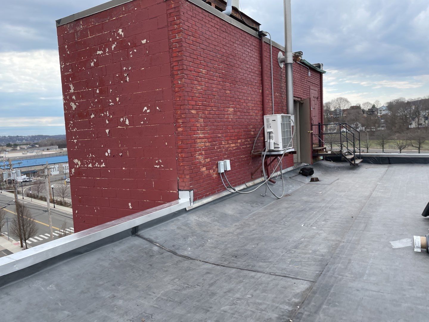 Commercial Roofing Installation using EPDM  by A Plus Exterior