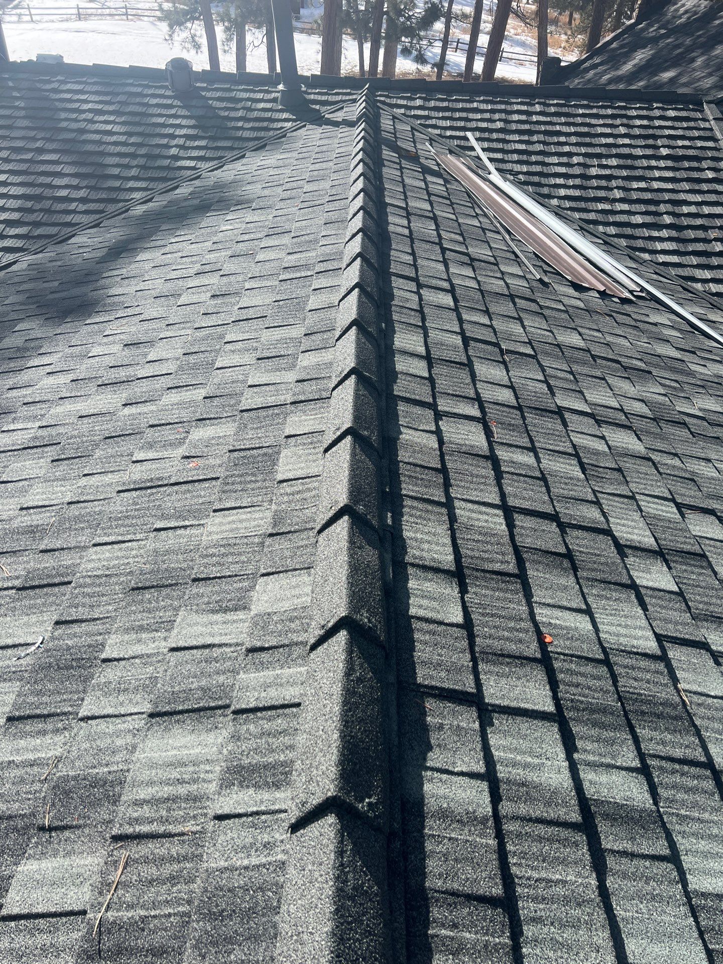 Residential Roofing Installation using Stone Coated Steel by Blue Peaks Roofing LLC 