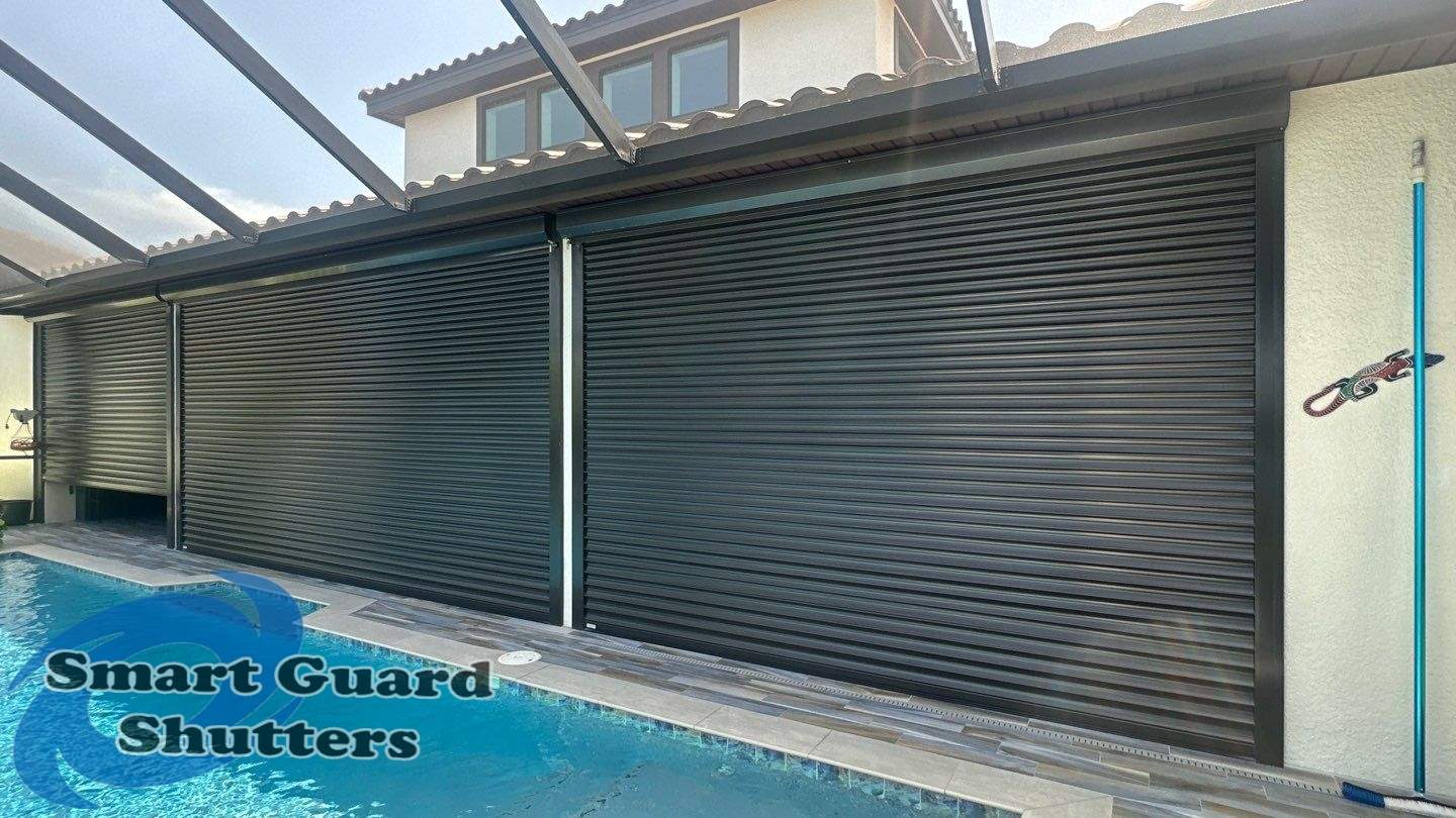 Motorized Rolling Shutter In Bronze by Smart Guard Shutters