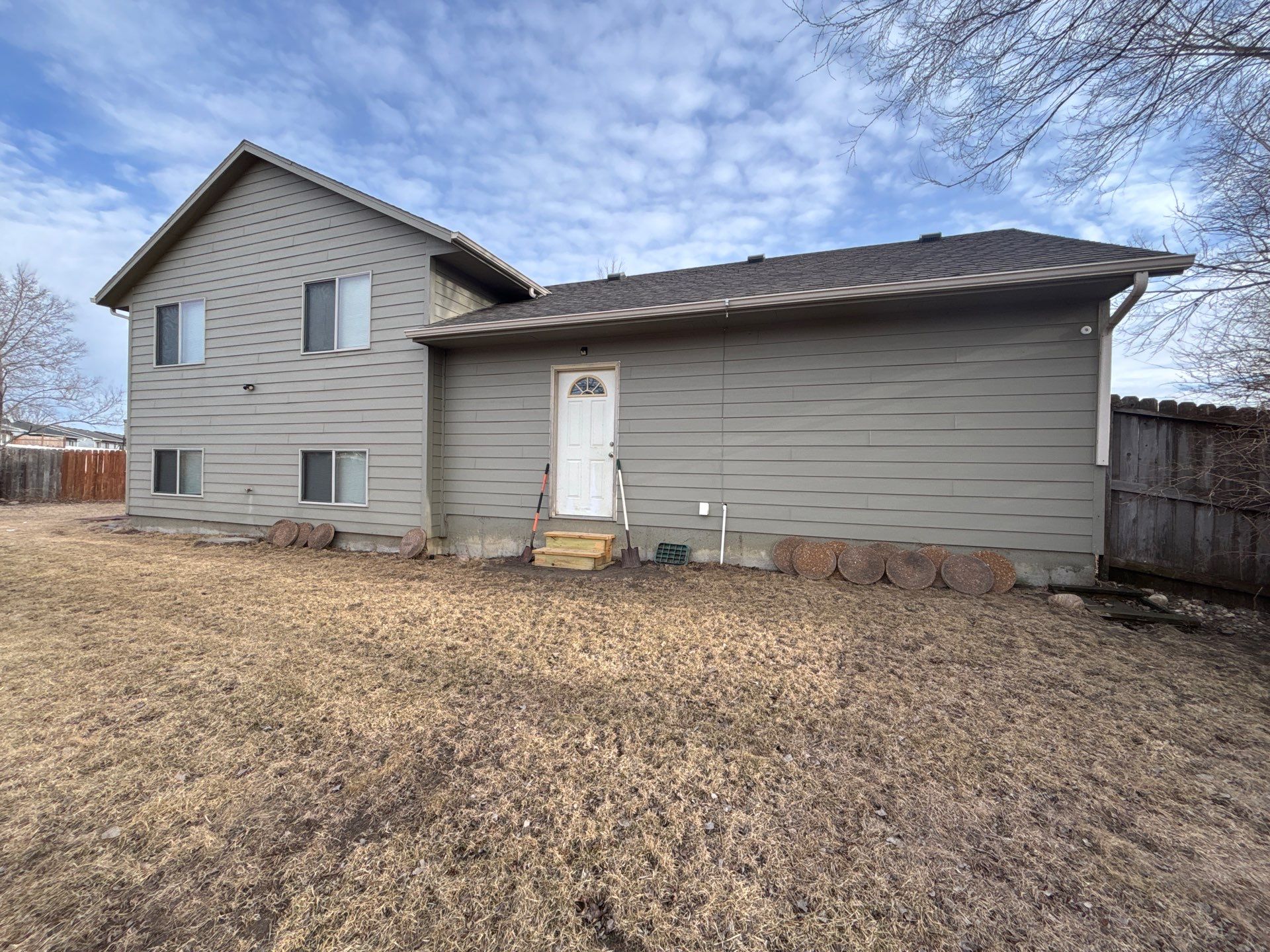 Full Exterior Residential Painting and Siding Refresh in Sioux Falls by Select Painting, Coatings & Garage Cabinets