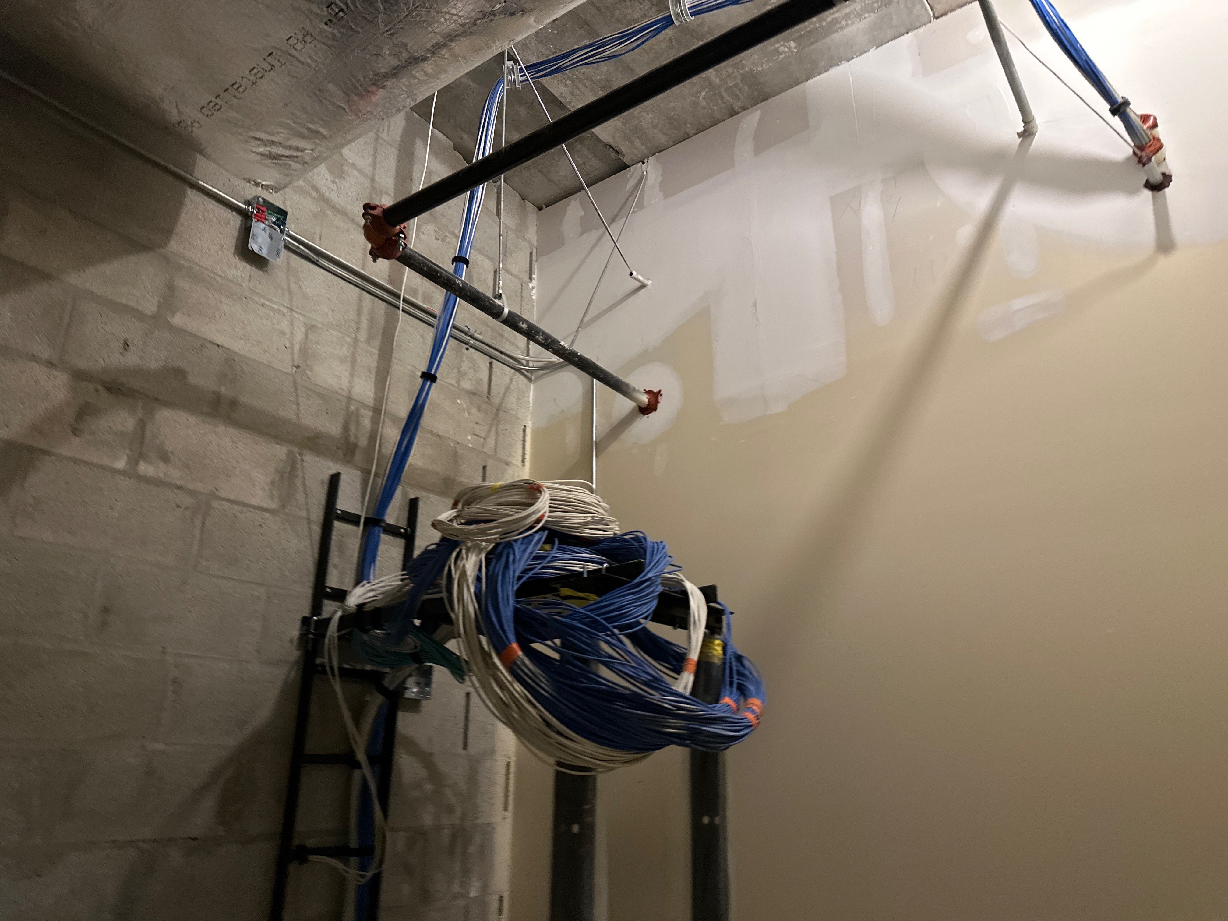 Title: K-12 School Expansion – Structured Cabling, Networking, Access Control & Security System – New Construction Addition by TeleCommPro