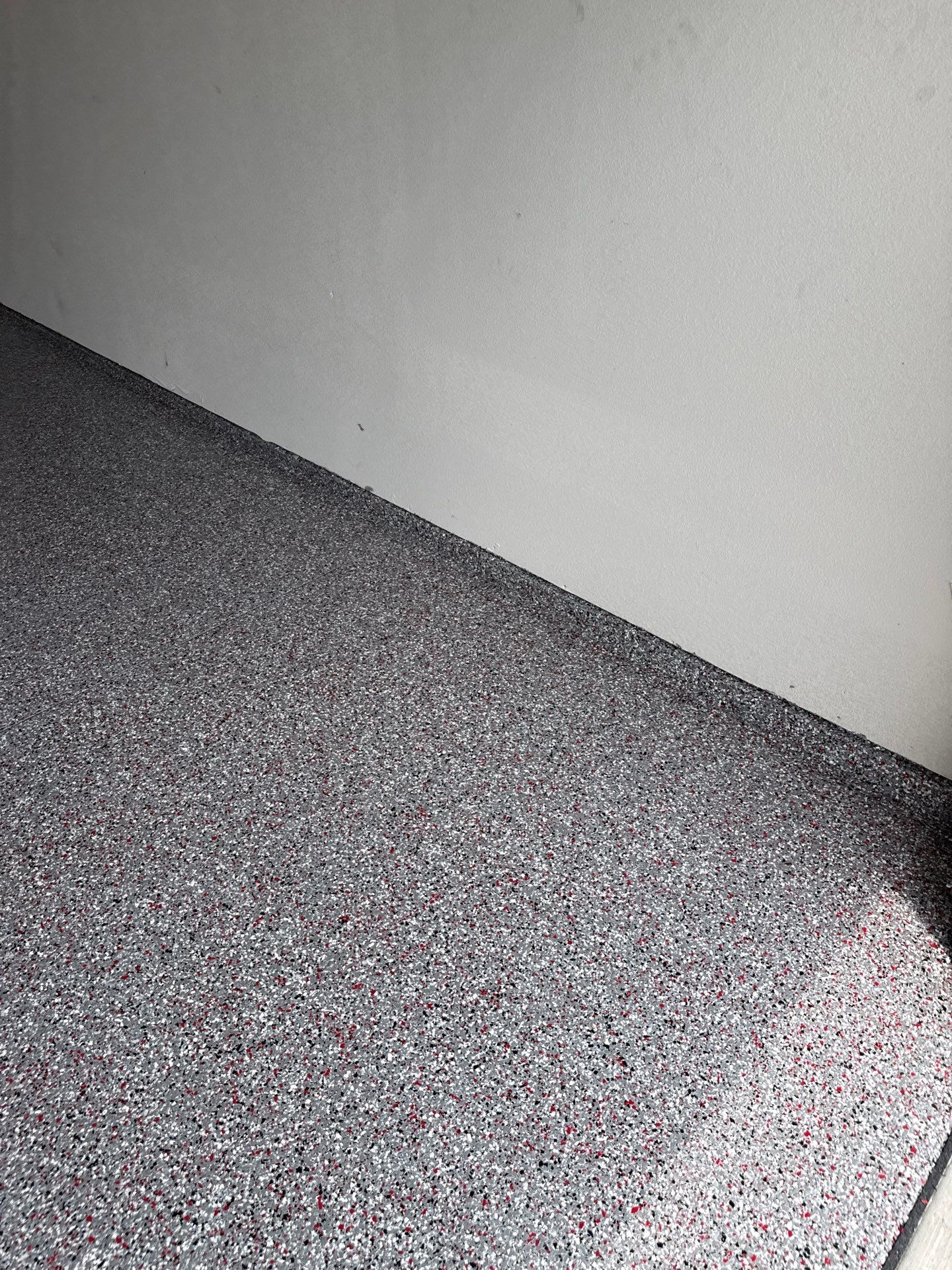 Custom Flake Garage Floor Coating Installation in Altoona by Revival Concrete Coatings