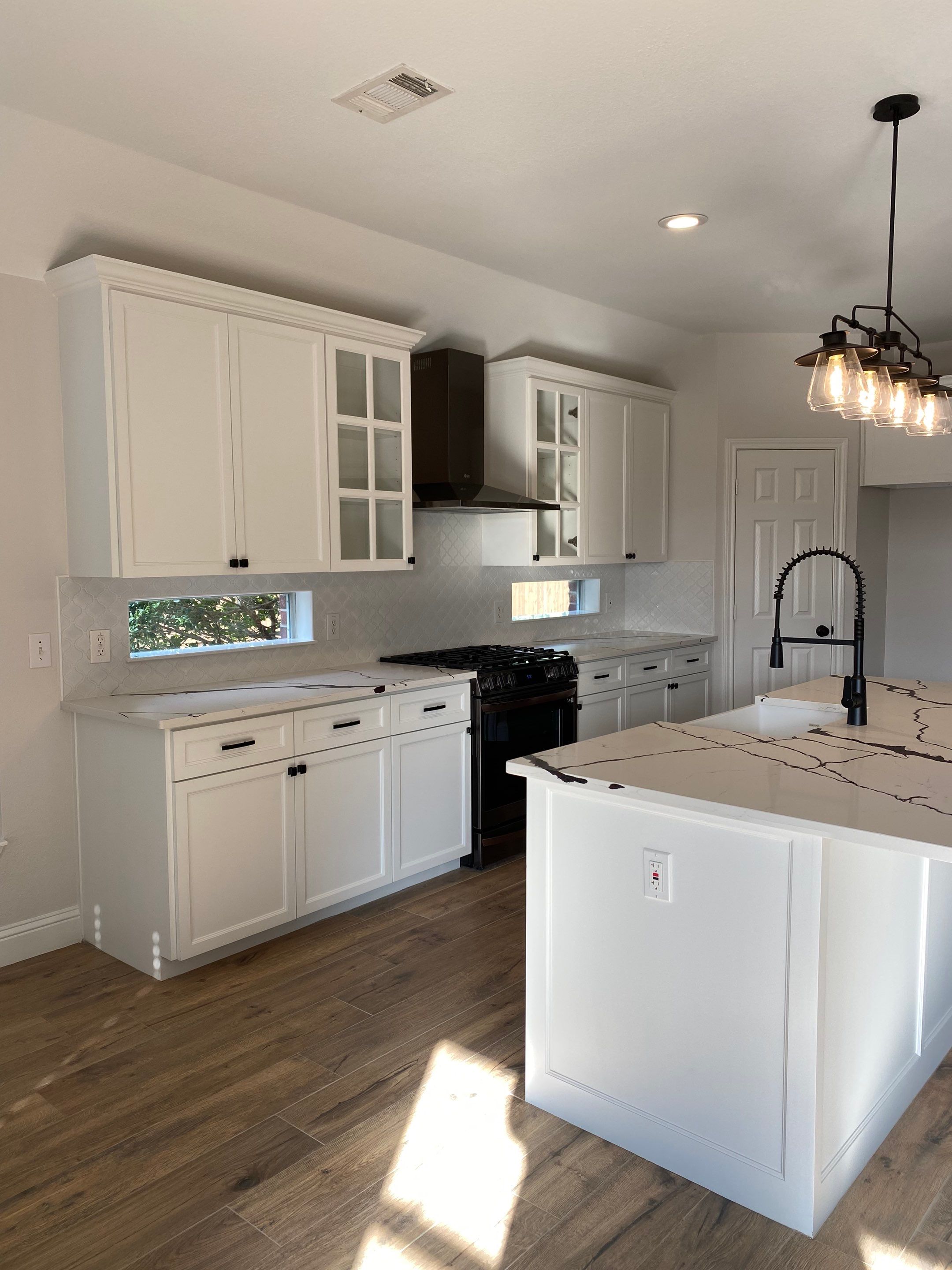 Custom cabinetry Kitchen Remodel by SLM General Contractors & Roofing