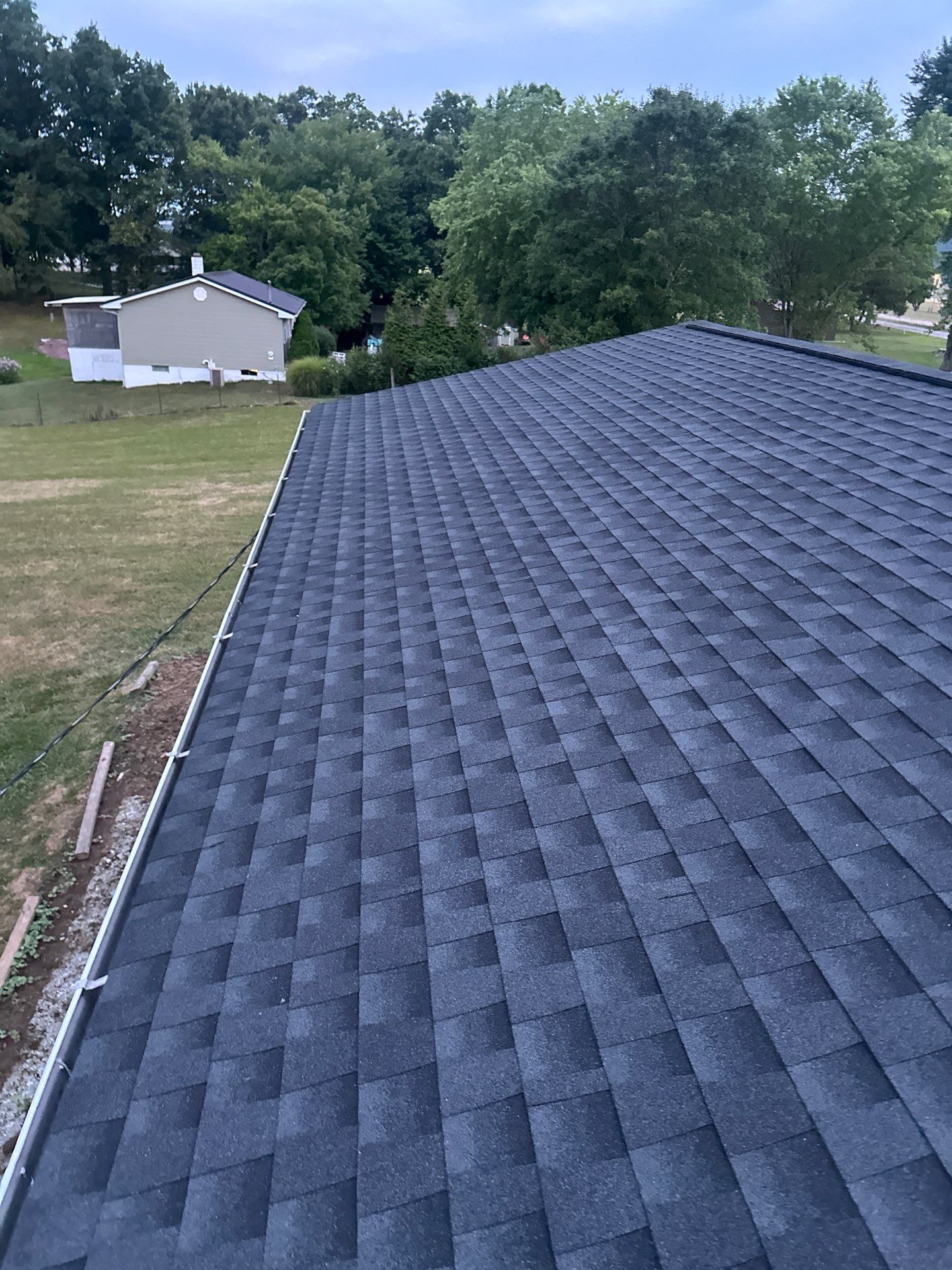 Residential Roofing Installation using GAF Timberline HDZ Charcoal by Rainstoppers Roofing