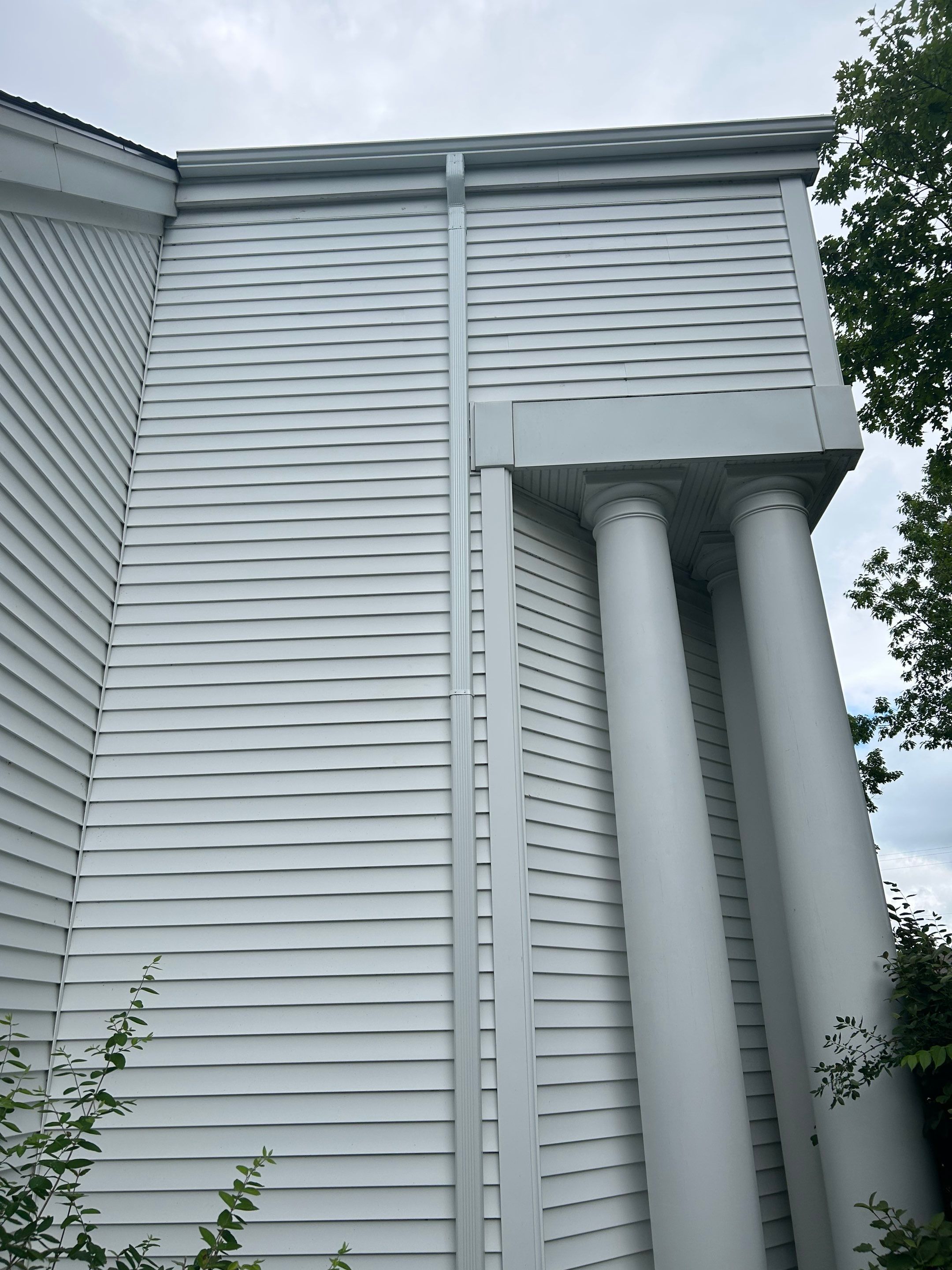 Gutter and Gutter Screen Installation for Harbor Springs Church by Rainbow Seamless Systems