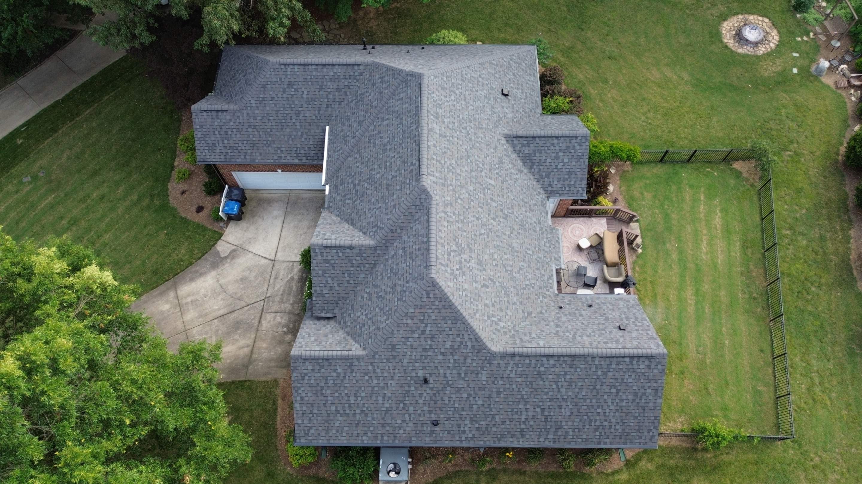 Residential Roof Replacement and Seamless Gutter Installation in Wesley Chapel, NC by Merritt Roofing LLC