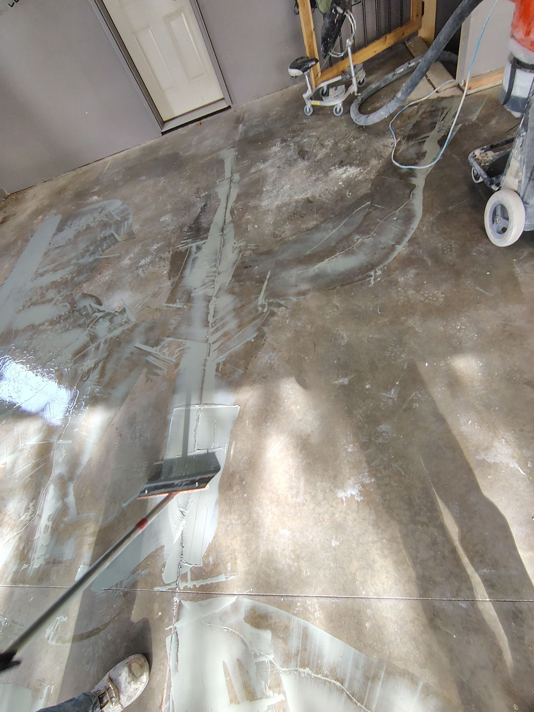 Garage Floor Concrete Coating and Crack Repair in Sioux Falls by Select Painting, Coatings & Garage Cabinets