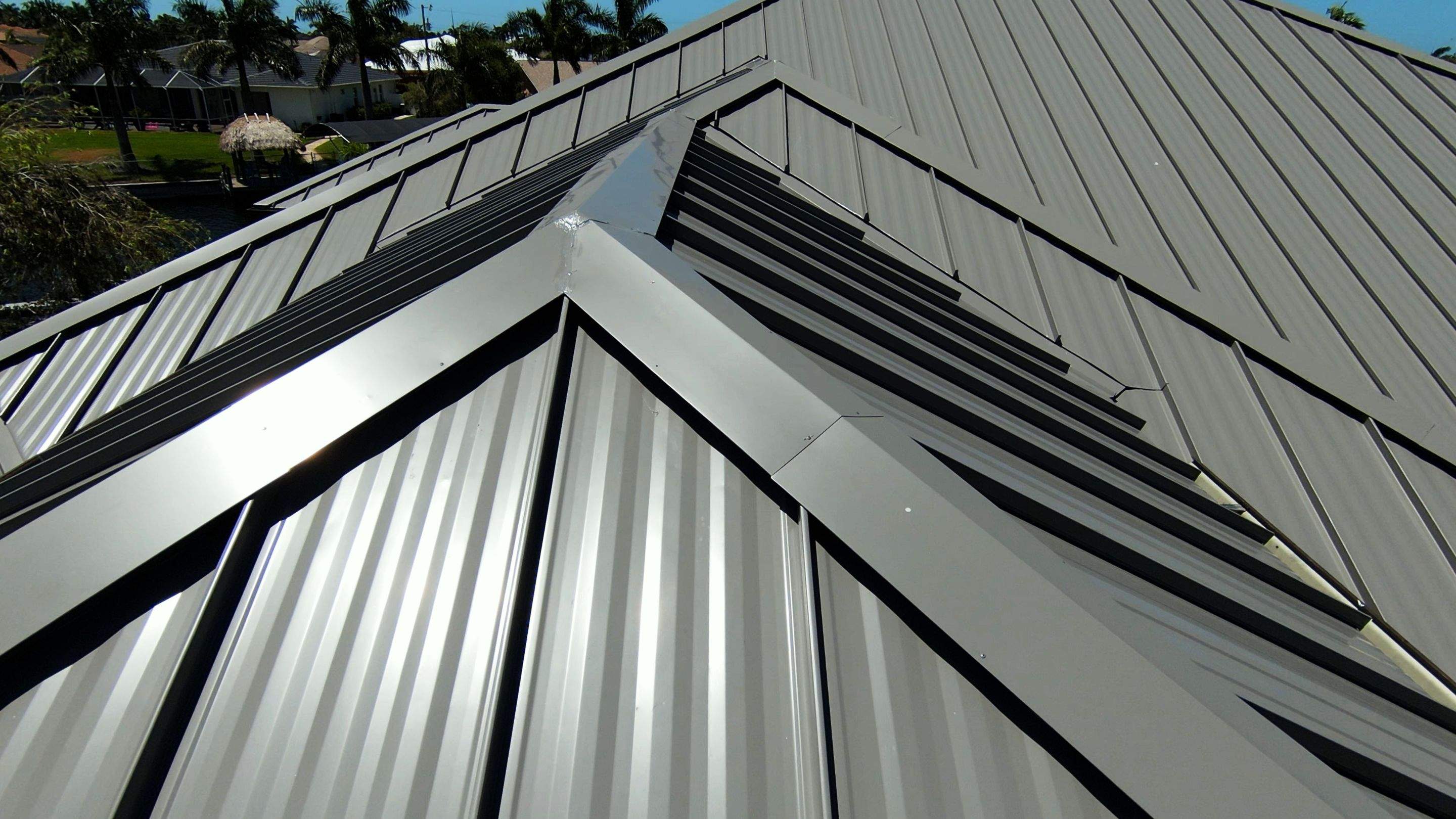 Residential Roofing Installation using Gulf Coast Metals Gulf Seam Panels by Four Peaks Roofing