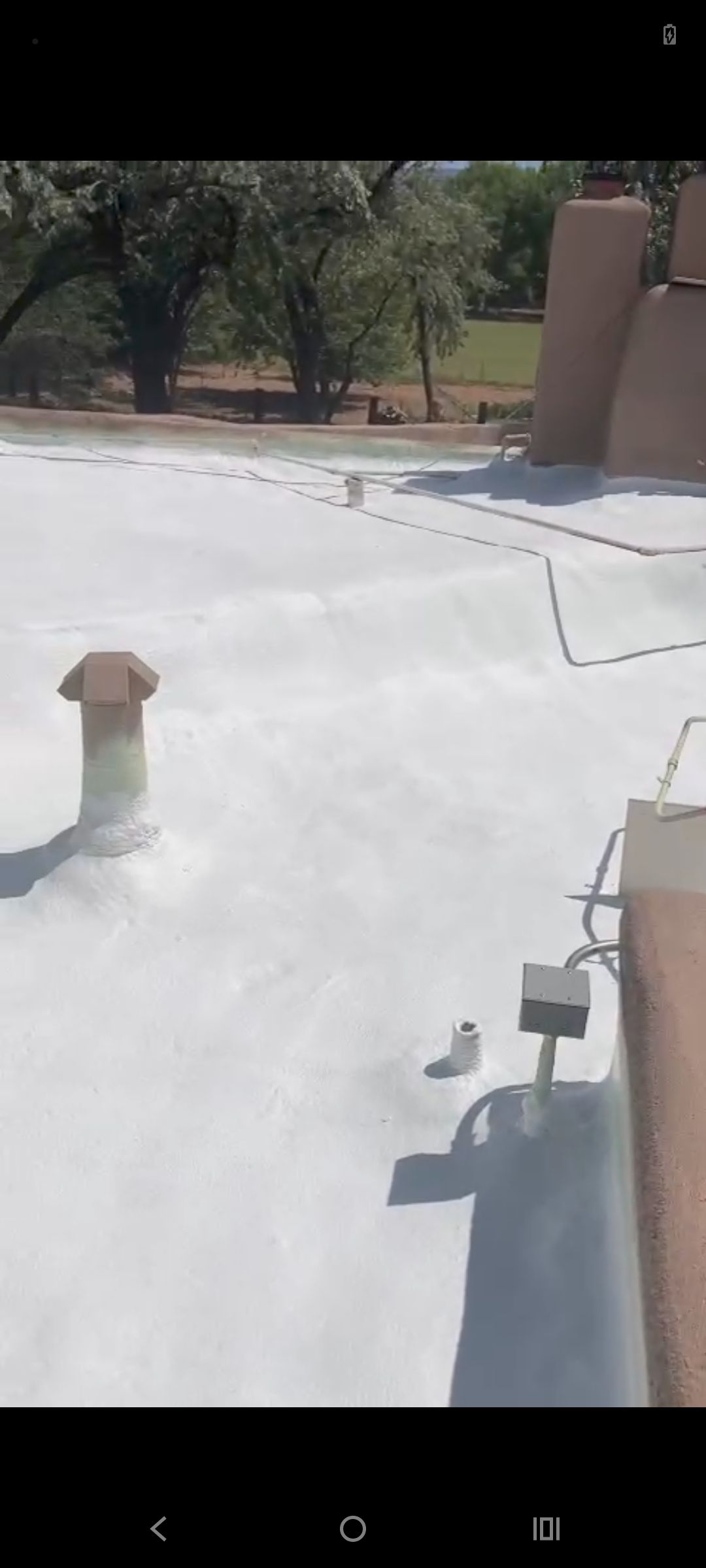 Residential roof application by SPF Services 