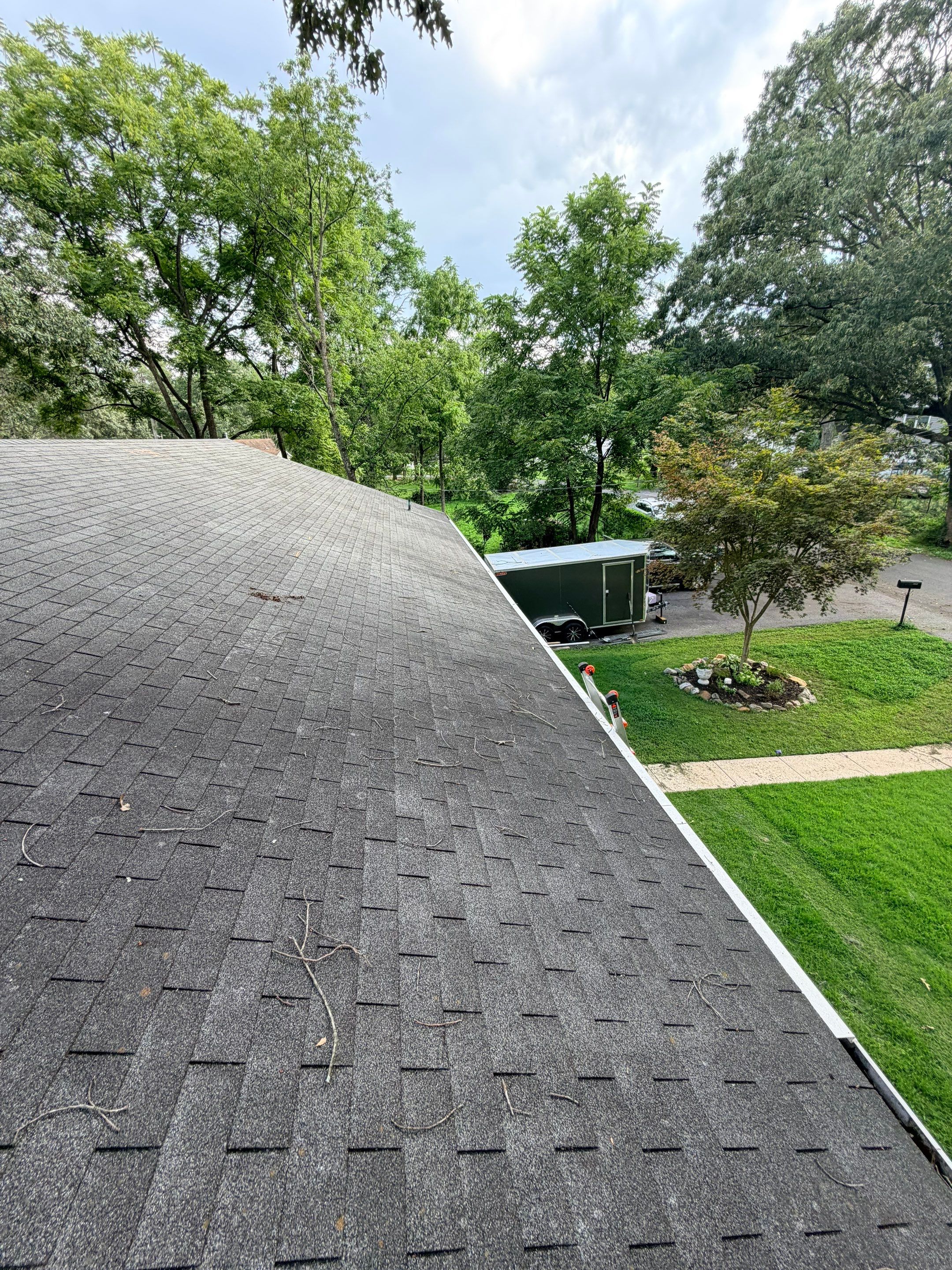 Full Roof Replacement and Gutter Guard Installation in Pasadena, Maryland by First Chesapeake Roofing