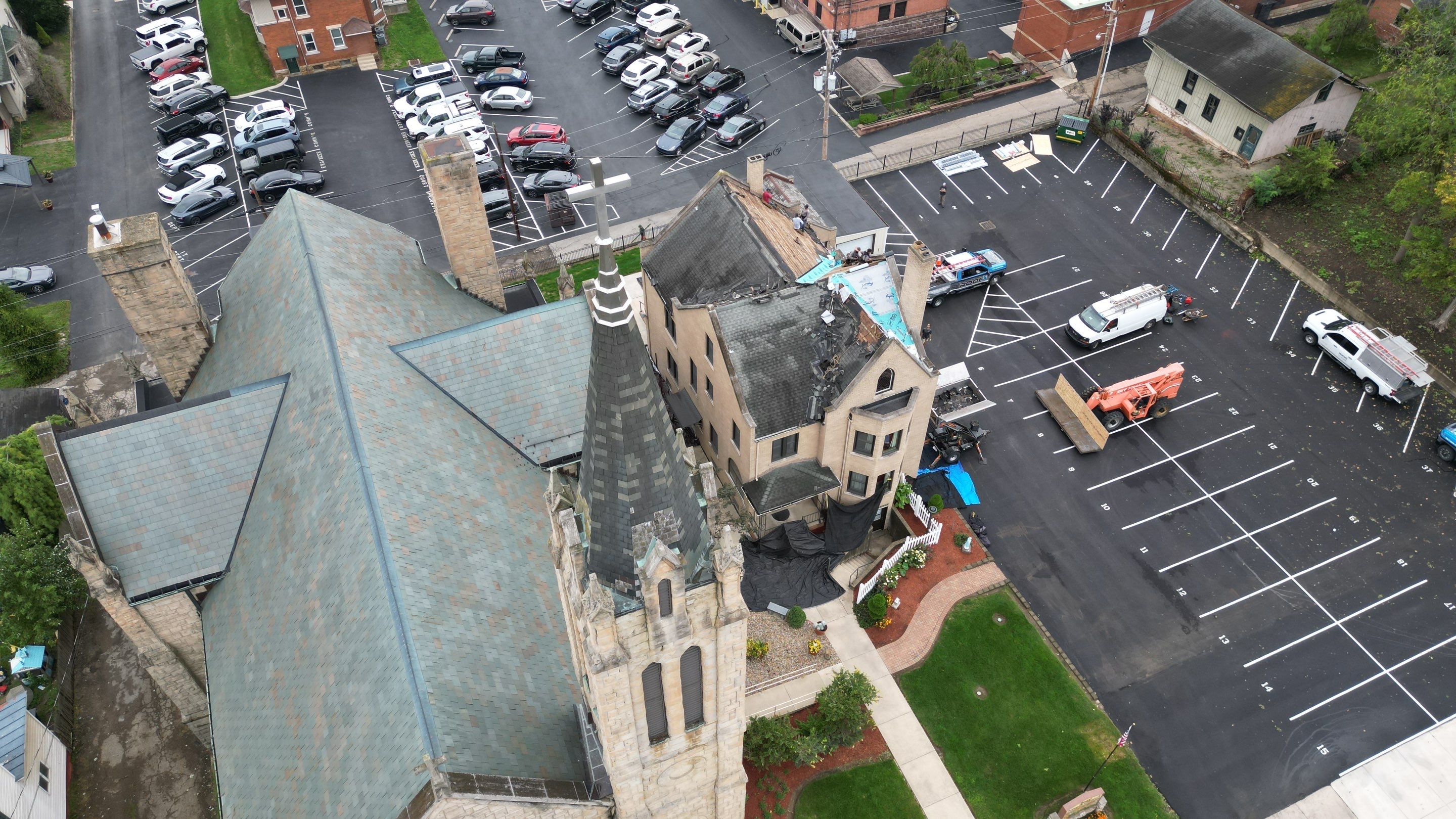Commercial Roofing Installation using Standing Seam Metal - Frost Black by RoofX 