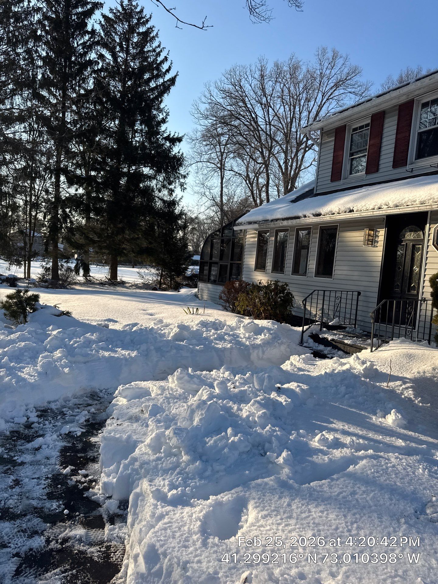 Asphalt Driveway Snow Clearing in Orange, CT by Diamond Image LLC