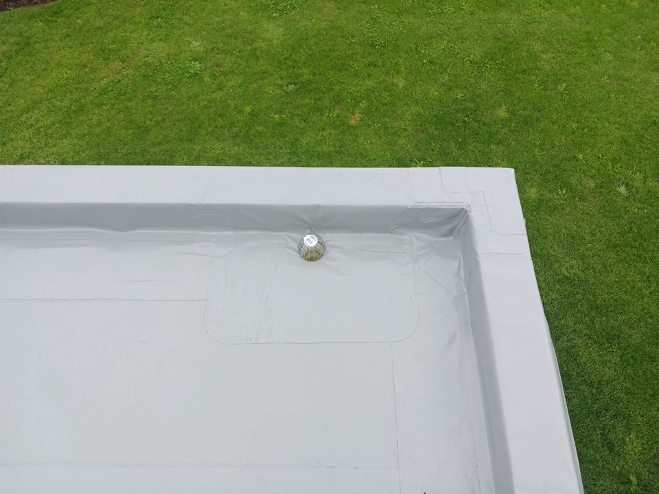 Residential Shop flat roofing Installation using Durolast membrane by Top Notch Roofing Inc