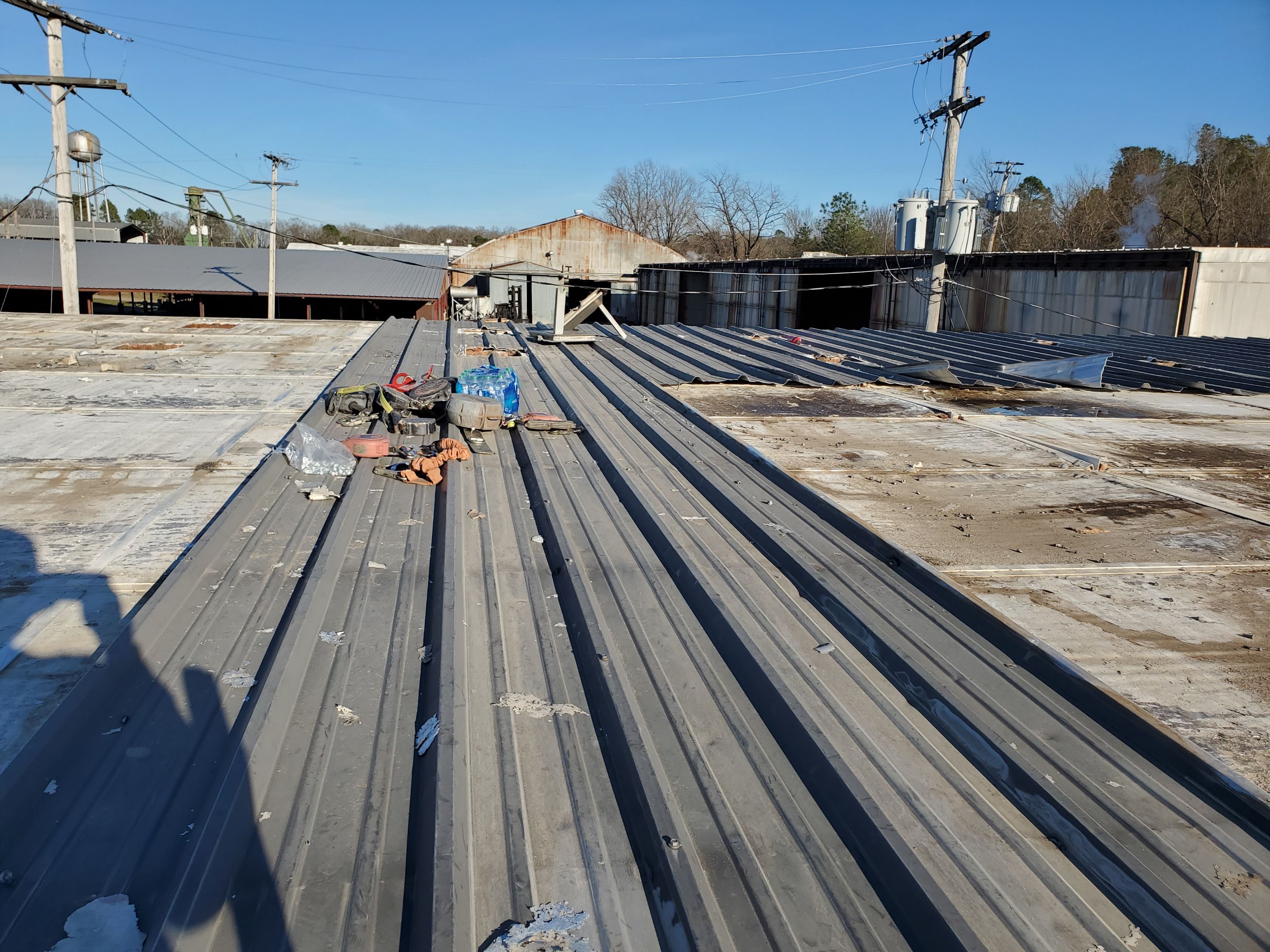 Commercial Roofing Installation using Aluminum Roofing panels by Hostetler Roofing