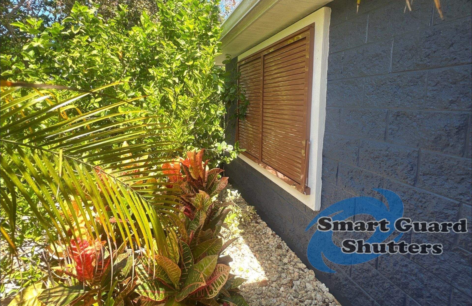 Impact Rated Bahama Shutters in Beige Brown by Smart Guard Shutters