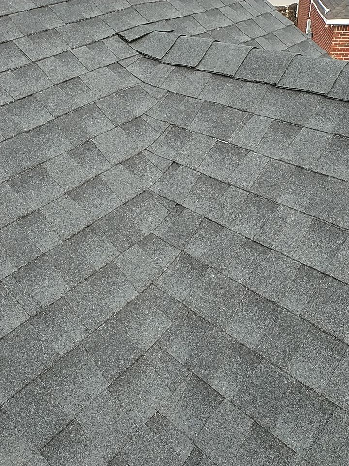 Residential Roofing Installation using Roof Replacement by American Roofing & Construction LLC