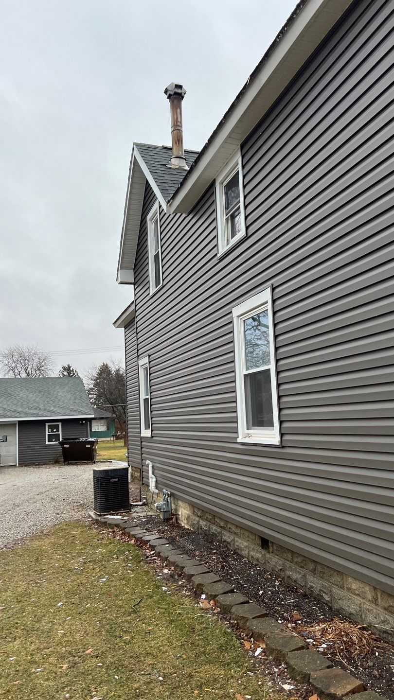 Residential fascia replacement using Exterior Portfolio 4.5 DL - Peppercorn by Nitro Roofing and Construction